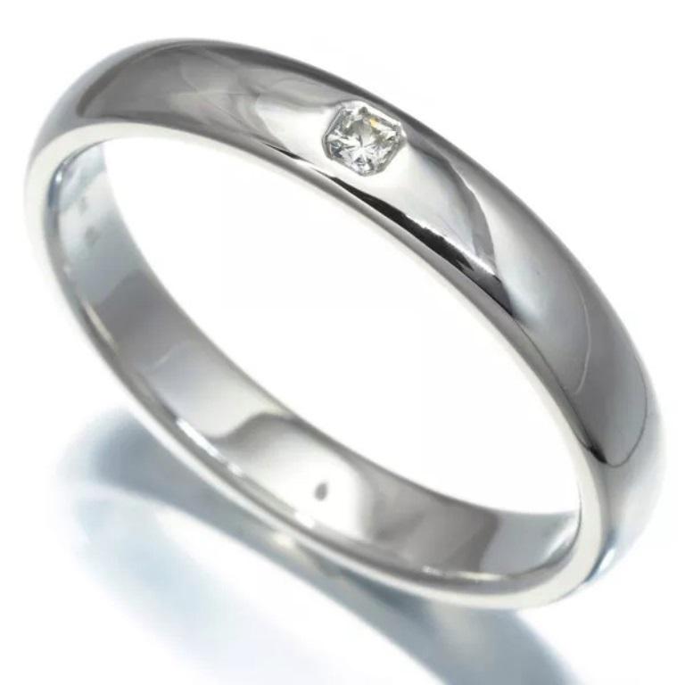 TIFFANY & Co. Forever Platinum Lucida Diamond 4mm Wedding Band Ring 10.5 

Metal: Platinum 
Size: 10.5
Band Width: 4mm
Weight: 8.80 grams 
Diamond: One Tiffany True® diamond (Lucida cut diamond), carat total weight .05
Hallmark: ©TIFFANY&CO. PT950