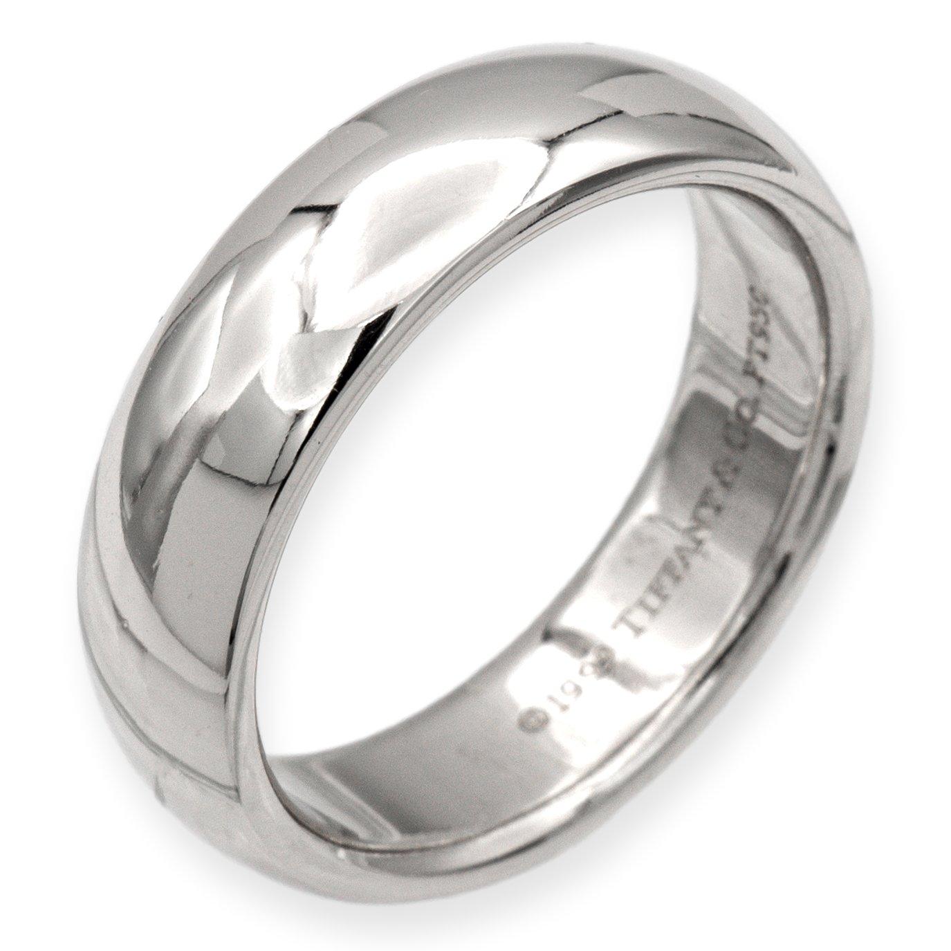 Tiffany & Co. 6mm Classic wedding band ring finely crafted in platinum. Made in 1999. Fully hallmarked with logo and metal content.

Ring Specifications
Brand: Tiffany & Co.
Style: Classic (comfort-fit)
Hallmarks: © 1999 Tiffany & Co. PT950
Finger
