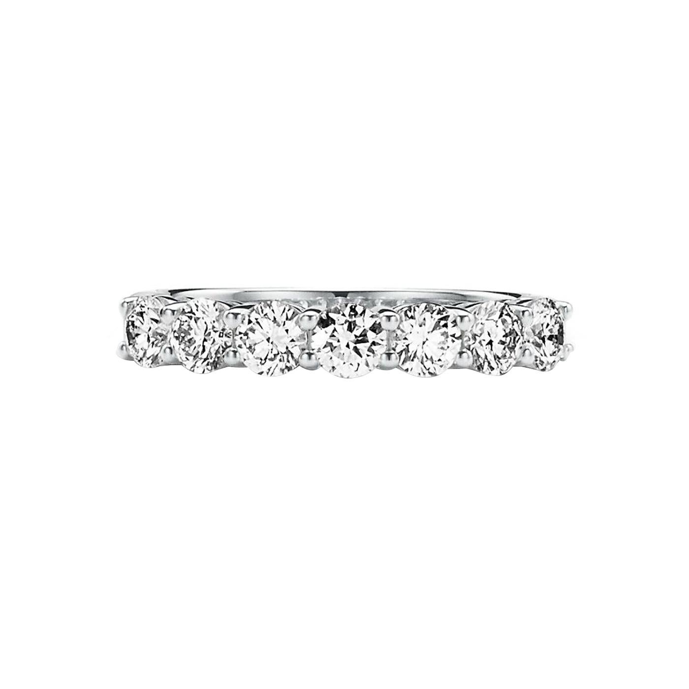 Every Tiffany Forever ring honors the enduring connection of enduring love and dedication. This platinum band ring is elevated to outstanding status by a half-circle of brilliant diamonds. For a traditional wedding set, pair it with an engagement
