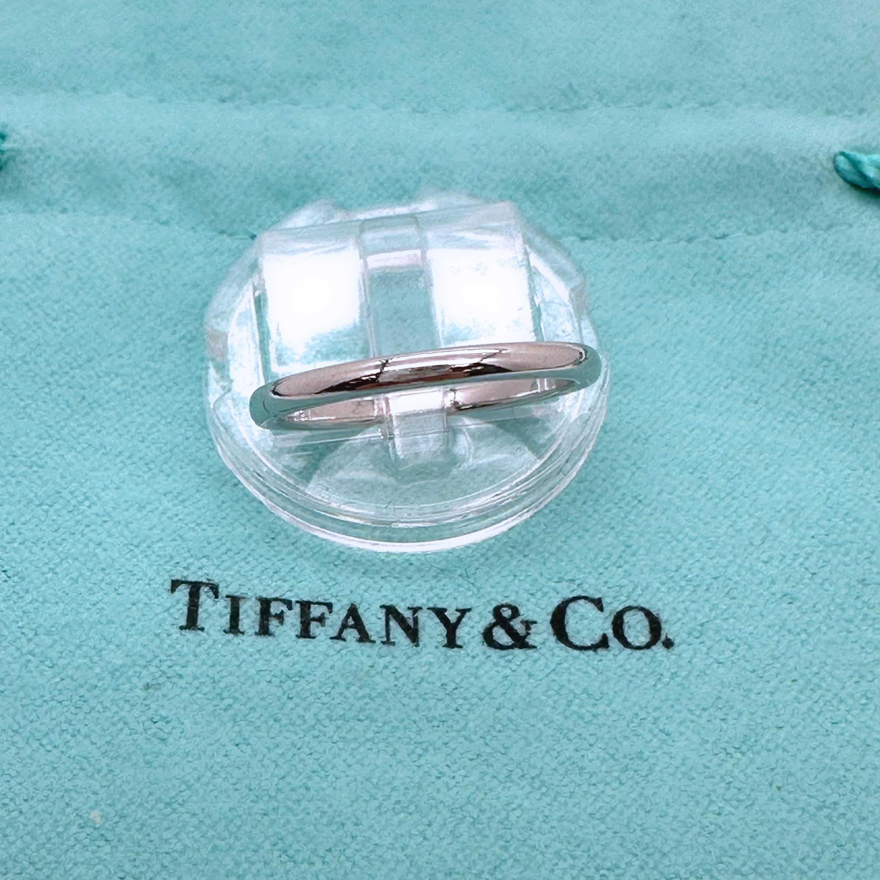 Tiffany & Co. Forever Wedding Band Ring 
Style:  Band
Ref. number:  60001623
Metal:  Platinum PT950
Size / Measurements:  6.5 sizable
Width:   2 mm
Hallmark:  TIFFANY&CO. PT950
Includes:  T&C Jewelry Pouch
Retail:  $ 950.00
Sku##1420TCH021424-6.5