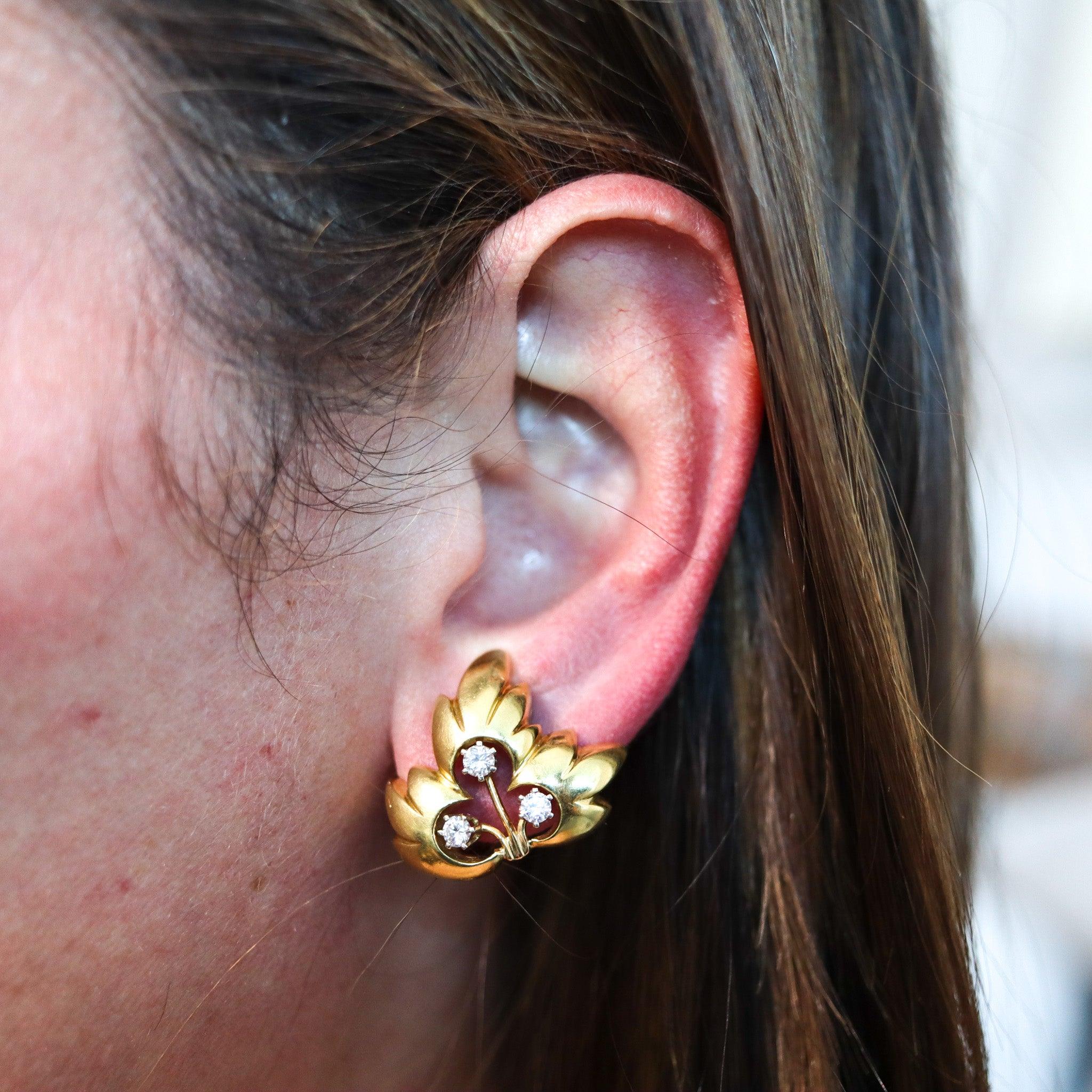 Pair of earrings designed by Tiffany & Co.

This rare pair of clips-on earrings was created in Paris France for the jewelry house of Tiffany & Co. in Europe, back in 1995. The earrings have been crafted as a left and right with leaves motifs in