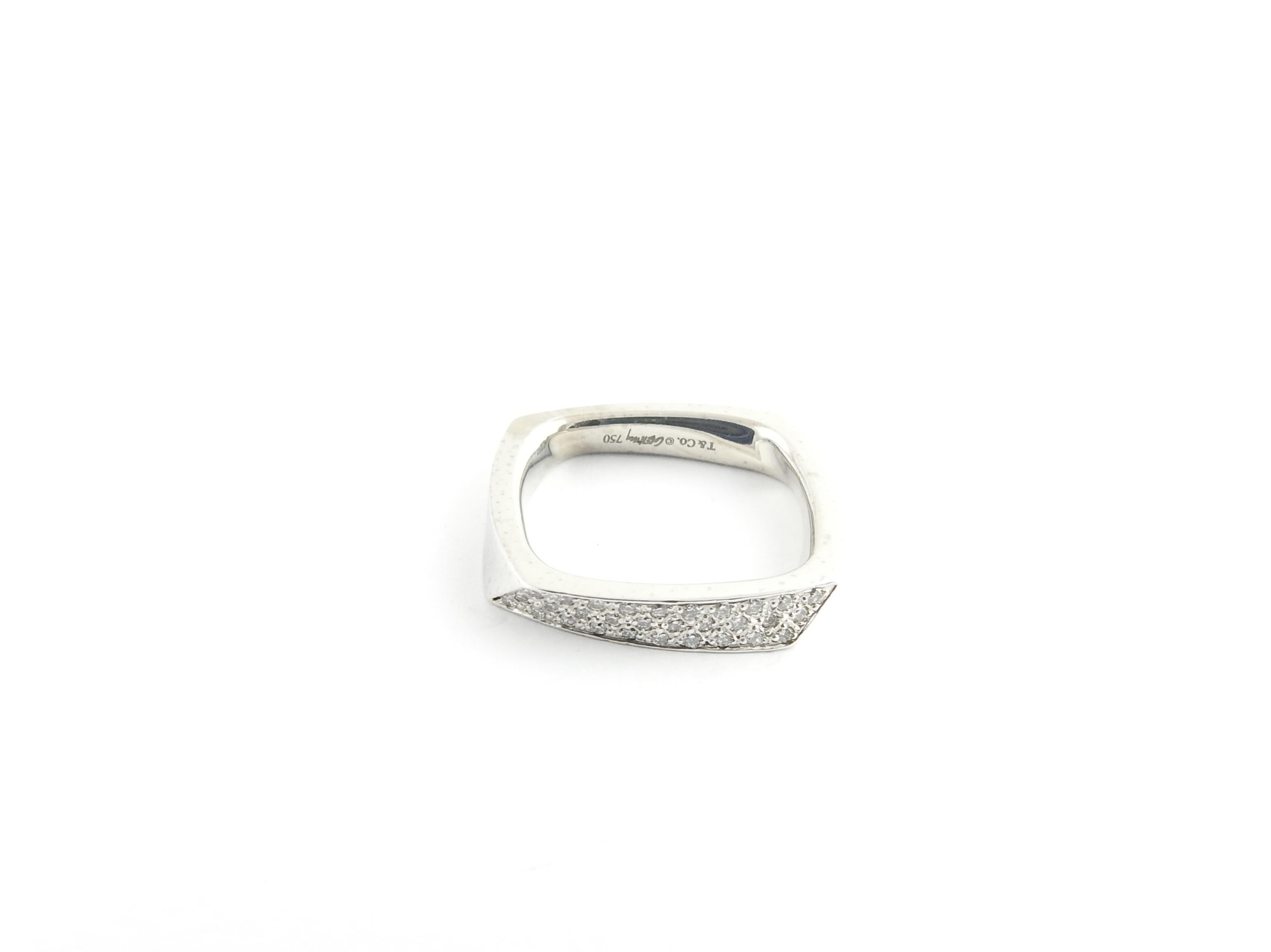 Tiffany & Co. Frank Gehry 18K White Gold Diamond Torque Ring

This authentic Frank Gehry for Tiffany & Co. ring is a size 6.5

Set with round brilliant pave diamonds totaling approx. .20 cts.

Diamonds are of VS1 clarity, G color

Band is approx.