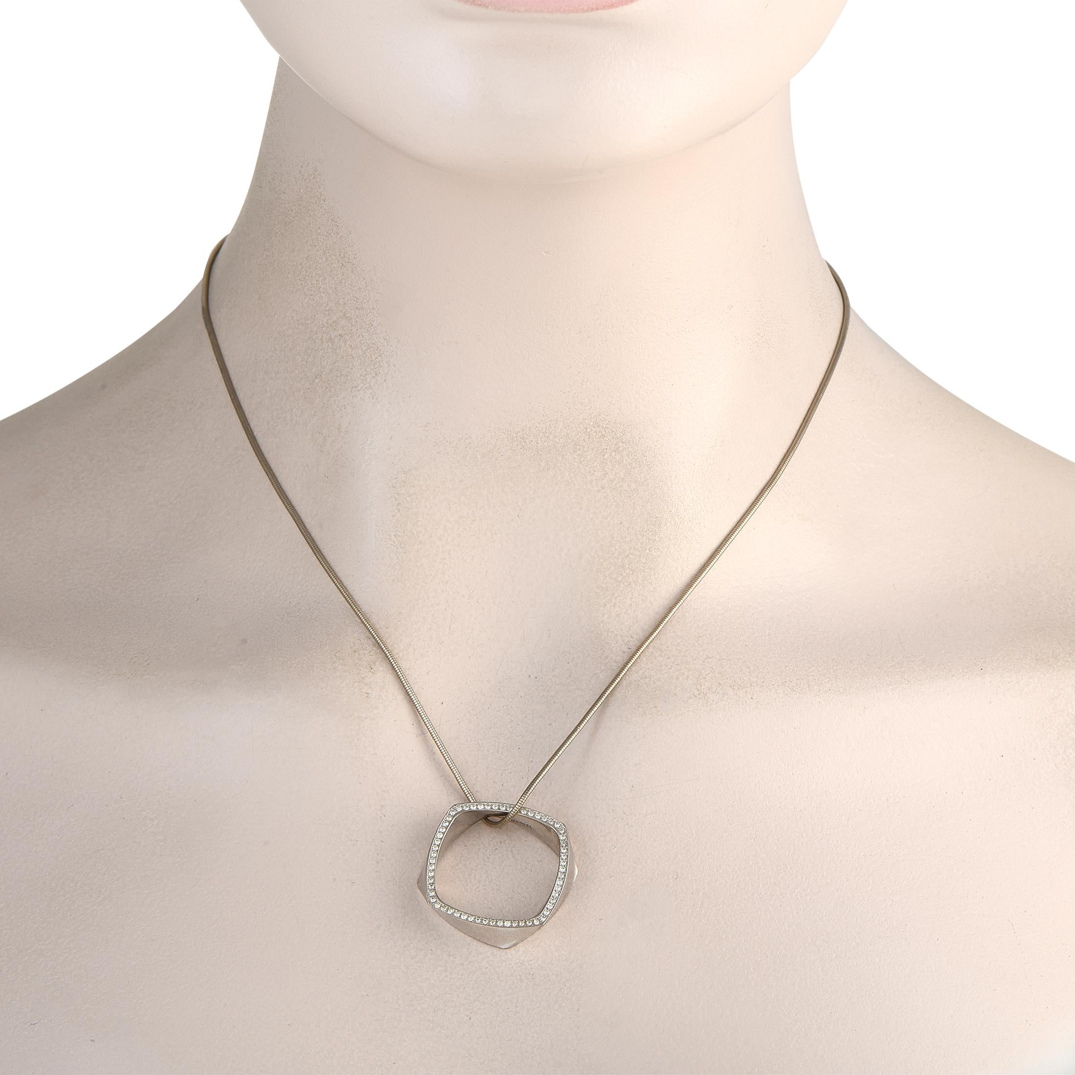 Minimal in appearance yet rich in style, this piece is a brilliant example of design that is both simple and ingenious. Designed by Frank Gehry for Tiffany & Co., this piece features a smooth and flexible snake chain that holds a sculptural pendant