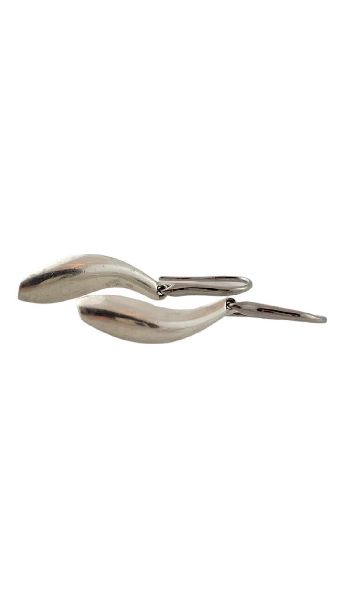 Tiffany & Co. Sterling Silver Frank Gehry Fish Hook Drop Earrings

This gorgeous set of earrings created by Frank Gehry and designer Tiffany & Co. were crafted from 925 sterling silver for a stunning finish!

Size: 36.85mm X 7.6mm X 5.3mm

Weight: