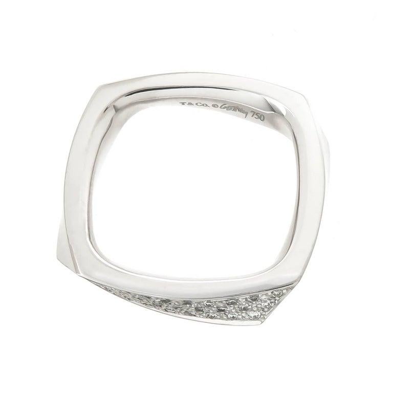 Circa 2014 Frank Gehry for Tiffany & Company 18K White Gold Torque Ring, set with Round Brilliant cut Diamonds totaling 1/3 Carat. Measuring 3 MM Thick, finger size 7 3/4.