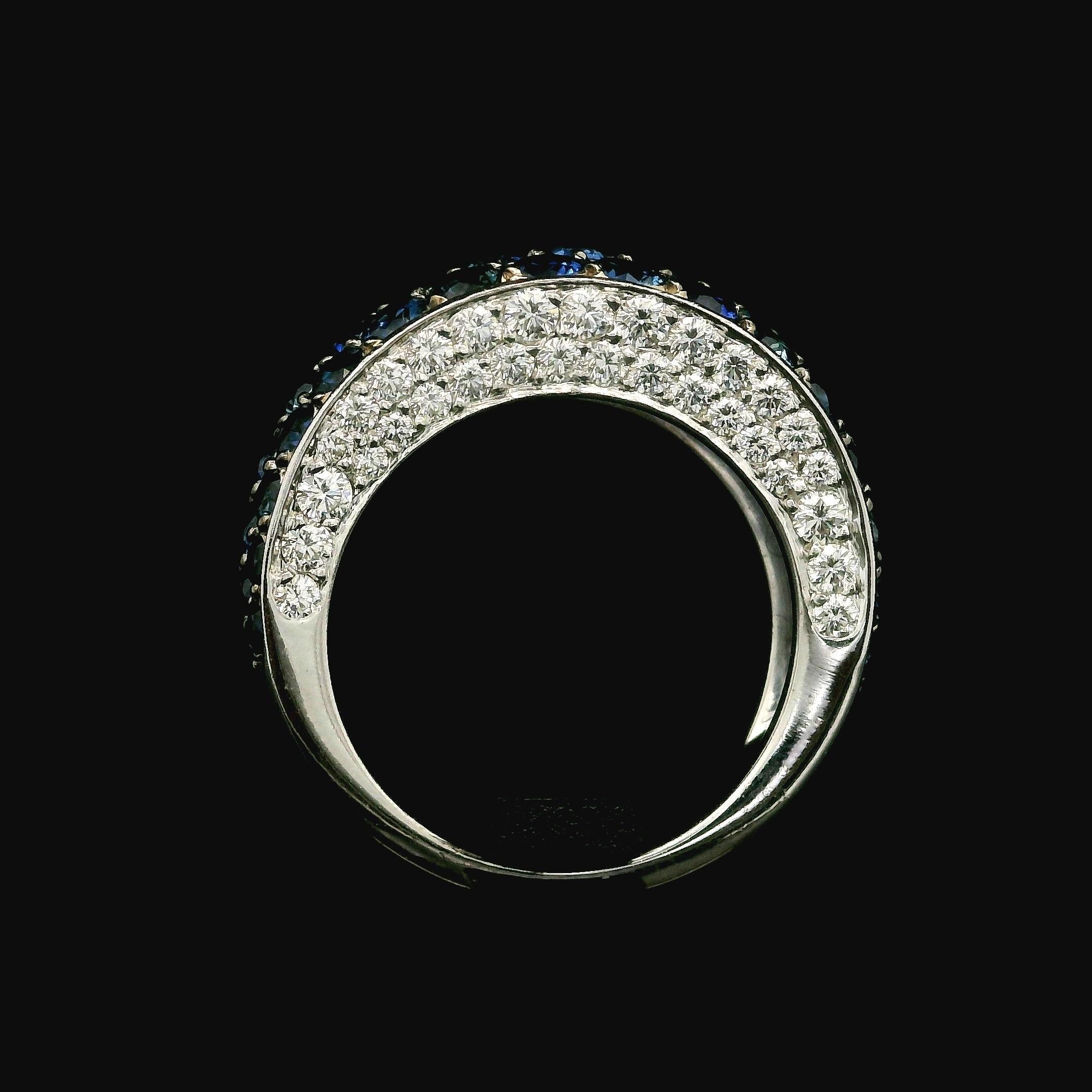 MUST SEE IN PERSON - BREATHTAKING!

--Stone(s):--
(49) Natural Genuine Sapphires - Round Brilliant Cut - Pave Set - Vivid Bright Royal Blue Color - Reall Pleasant - Slight natural variation in color - 2.15ctw (exact)
(62) Natural Genuine Diamonds -