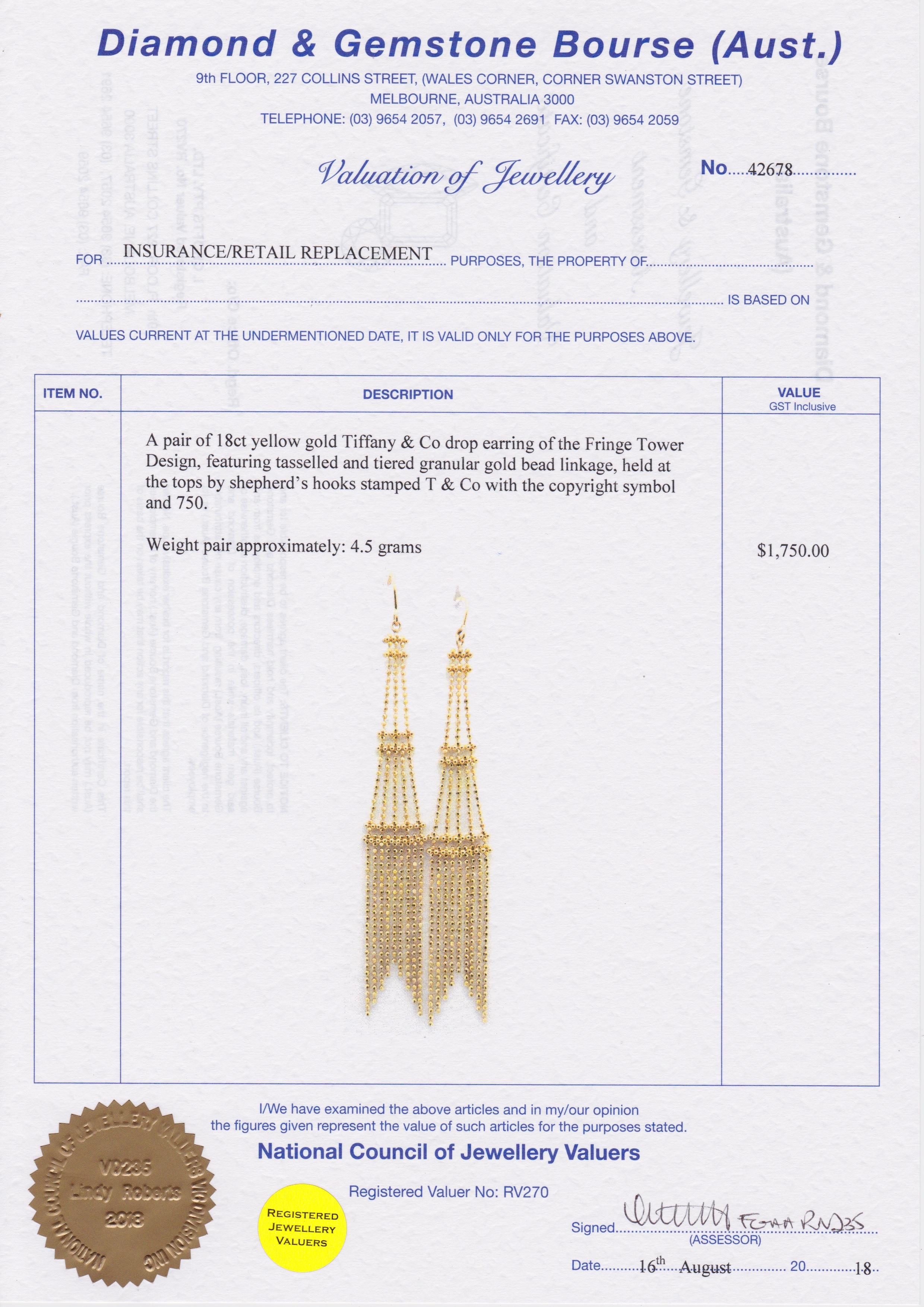 A pair of 18ct yellow gold Tiffany & Co, New York 'Fringe Tower' design drop earrings featuring elegant, tasselled chain tiers suspended on shepherd's hooks, stamped T & Co, 750. 4.5 grams