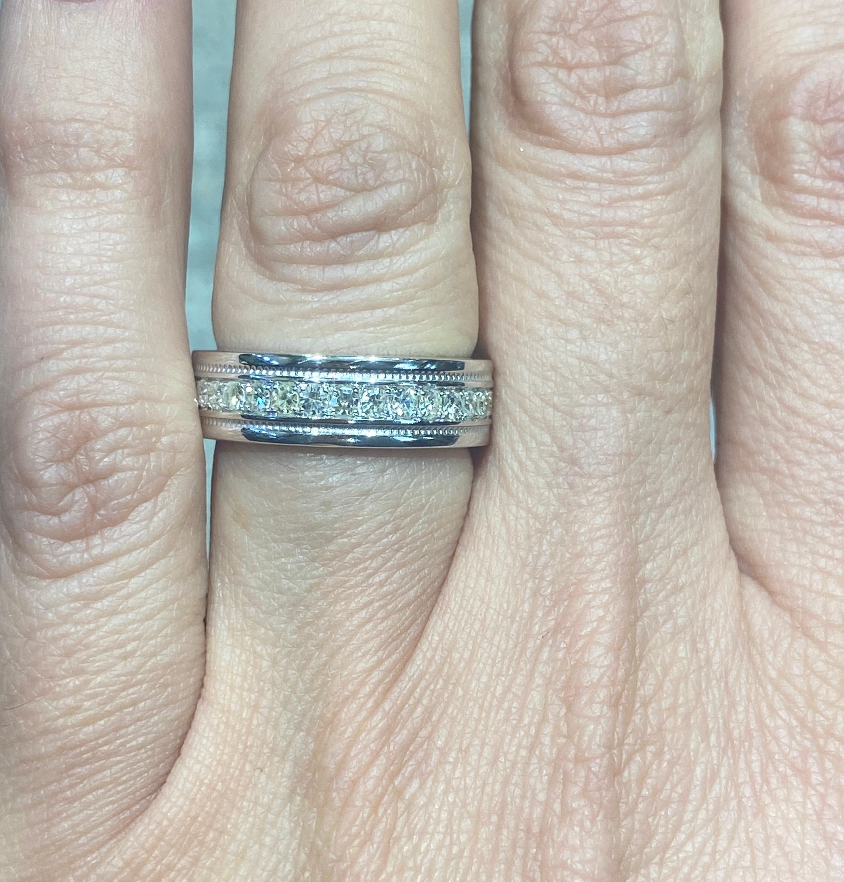 This is a beautiful Tiffany & Co white gold eternity ring with a full circle of diamonds. It is a classic.