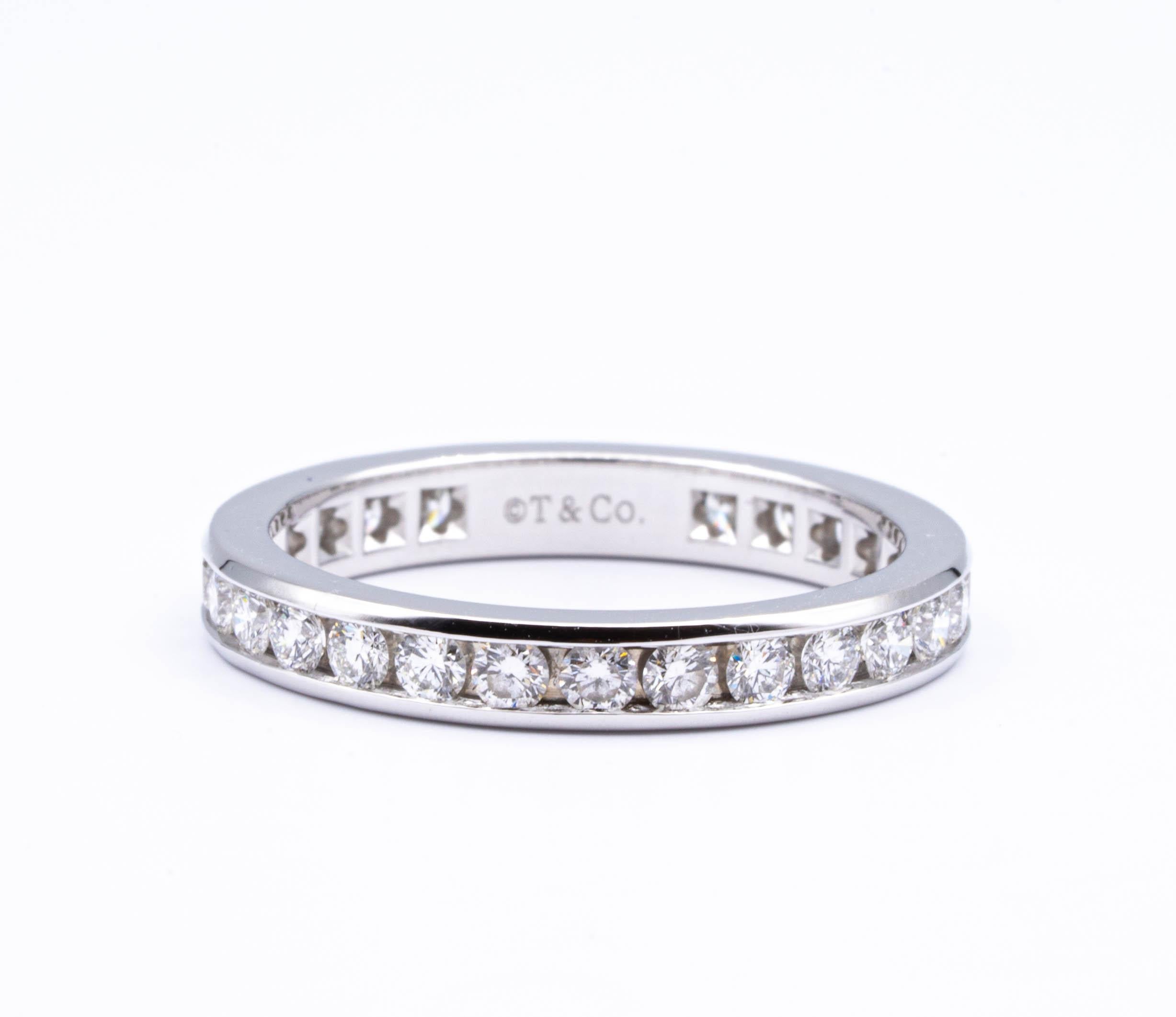 Tiffany & Co. wedding band finely crafted in platinum, with round brilliant cut diamonds weighing 1.00 carats total weight approximately set all the way around in a channel setting in Platinum. The ring is 3mm wide. (Retails $5,200)
Comes in