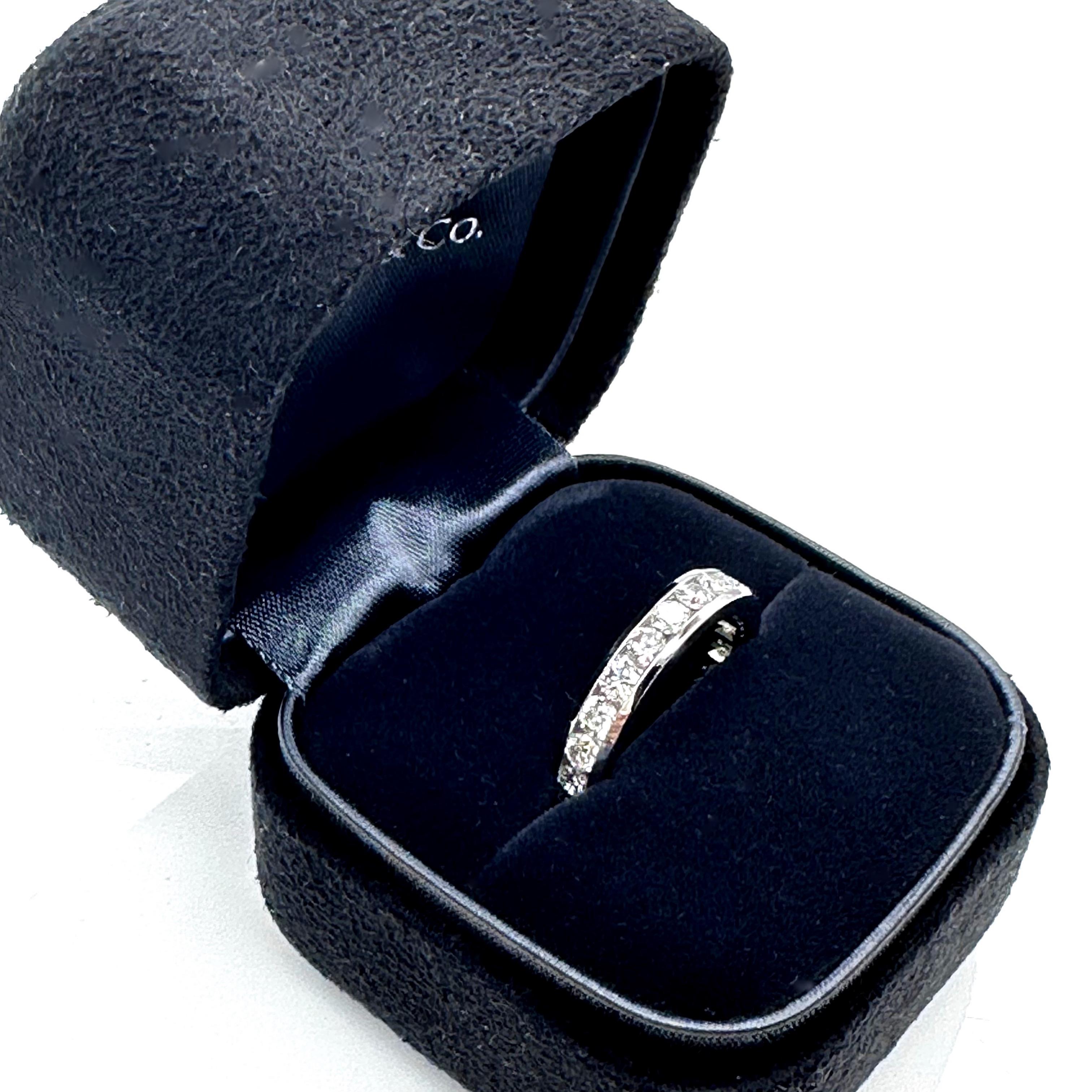 Tiffany & Co. Full Circle Channel Set 4 mm Wedding Band Ring
Style:  Channel-Set Full Circle
Ref. number:  6003428
Metal:  Platinum PT950
Size:  6.25
Width:  4 mm
TCW:  1.80 tcw
Main Diamond:  22 Round Brilliant Diamonds
Hallmark:  ©TIFFANY&CO.