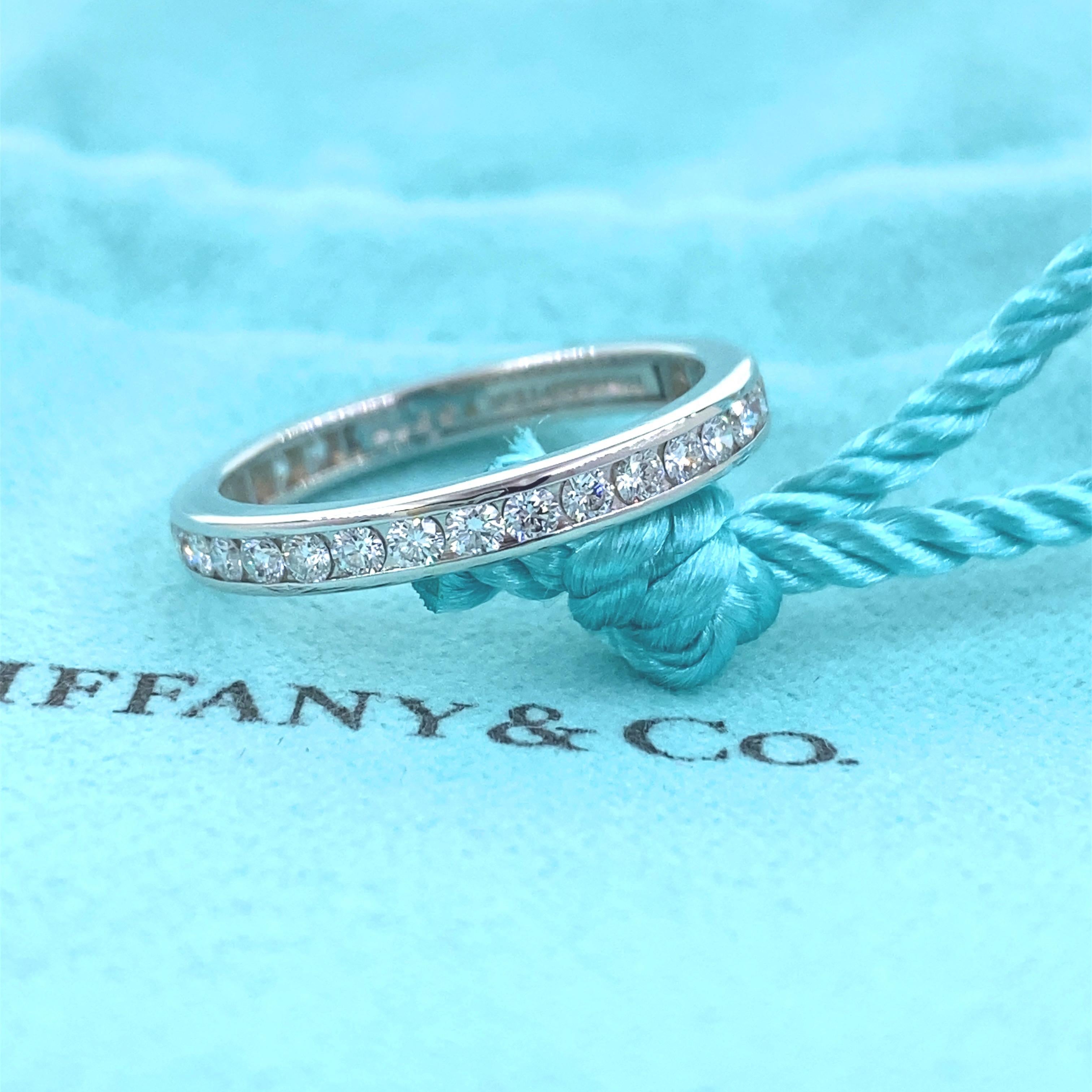 Tiffany & Co. Full Circle Diamond Eternity Wedding Band Ring
Style:  Full Circle Channel Set Eternity
Metal:  Platinum PT950
Width:  2.5 MM
Size:  5.75
TCW:  0.56 tcw
Main Diamond:  Round Brilliant Diamonds
Color & Clarity:  F - G / VS 
Hallmark: 
