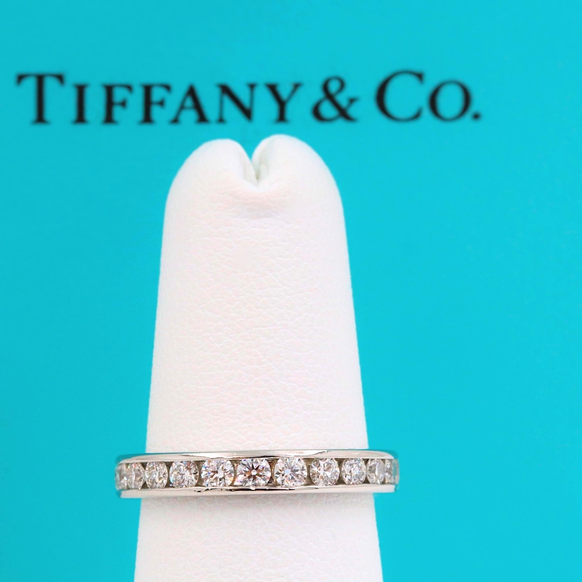 Tiffany & Co. 

Style:  Full Circle Diamond Wedding Band Ring
Metal:  Platinum PT950
Width:  3 MM
Size:  4.25 
Total Carat Weight:  1.00 tcw
Diamond Shape:  Round Brilliant
Diamond Color & Clarity:  G - VVS
Hallmark:  ©TIFFANY&CO.PT950 
Includes: 