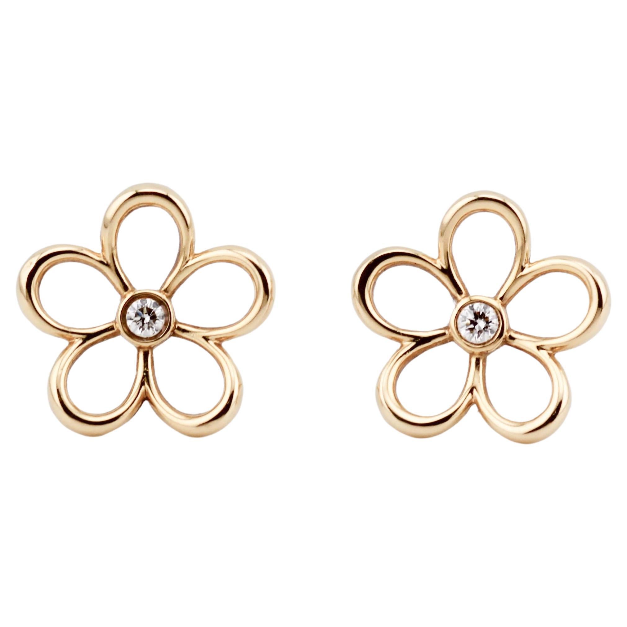 Tiffany
Co. Orecchini a perno in oro 18k con diamanti a forma di fiore di giardino