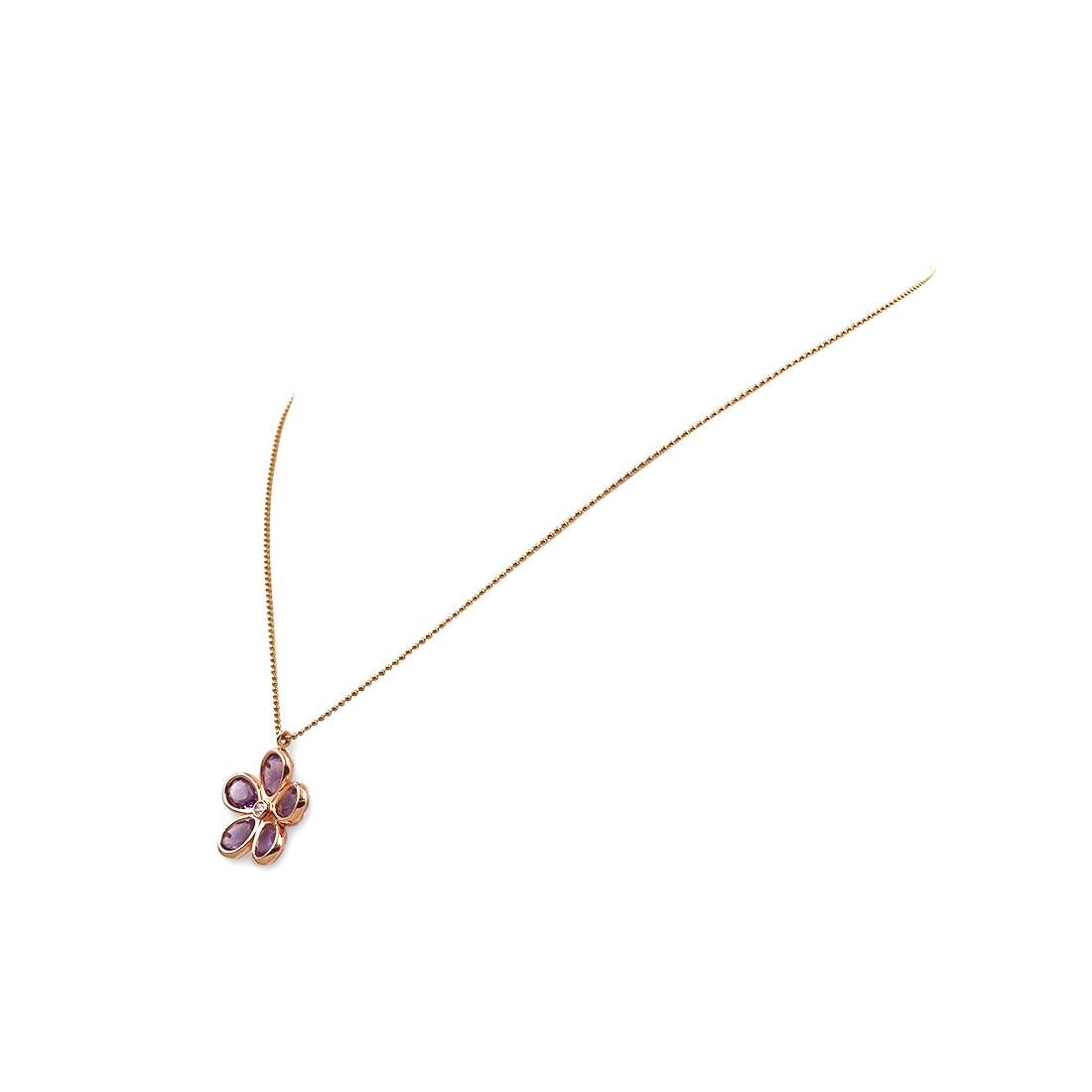 Authentic Tiffany & Co. 'Garden Flower' pendant necklace crafted in 18 karat rose gold. Five teardrop-shaped faceted amethyst stones create the petals with a single round brilliant cut diamond of approximately .04 carats set at the center of the