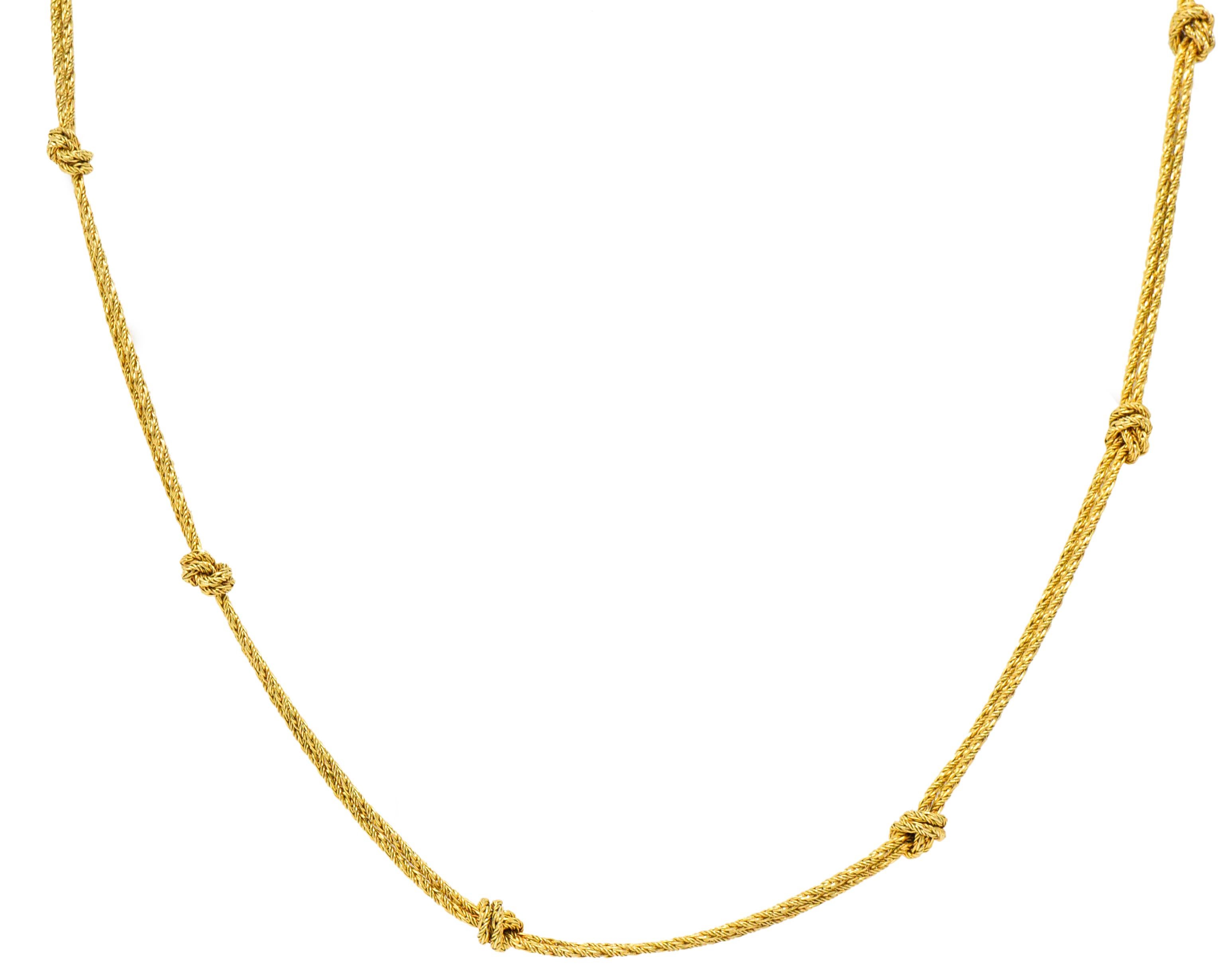 Woven wheat style  double chain 

With knotted chain stations

Completed by a lobster clasp 

Fully signed Tiffany & Co. Germany

Accompanied by original pouch

Length: 24 Inches

Width: 1/4 Inch (widest knot)

Total Weight: 17.7 Grams

Chic.