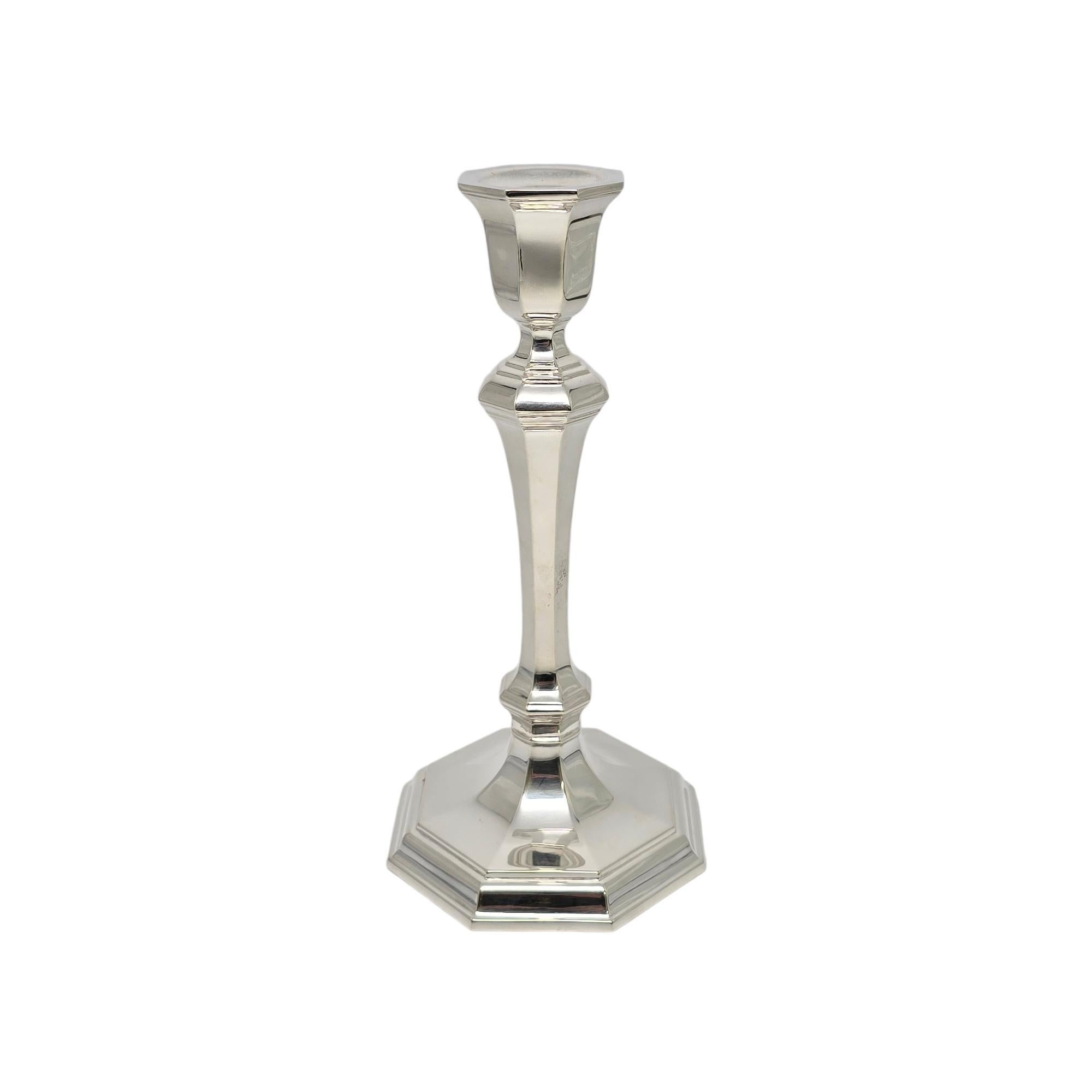 Sterling silver candlestick holder by Tiffany & Co.

Beautiful classic octagonal shaped candlestick in Art Deco style, circa 1920. Does not include Tiffany box or pouch.

Measures approx 9 1/4
