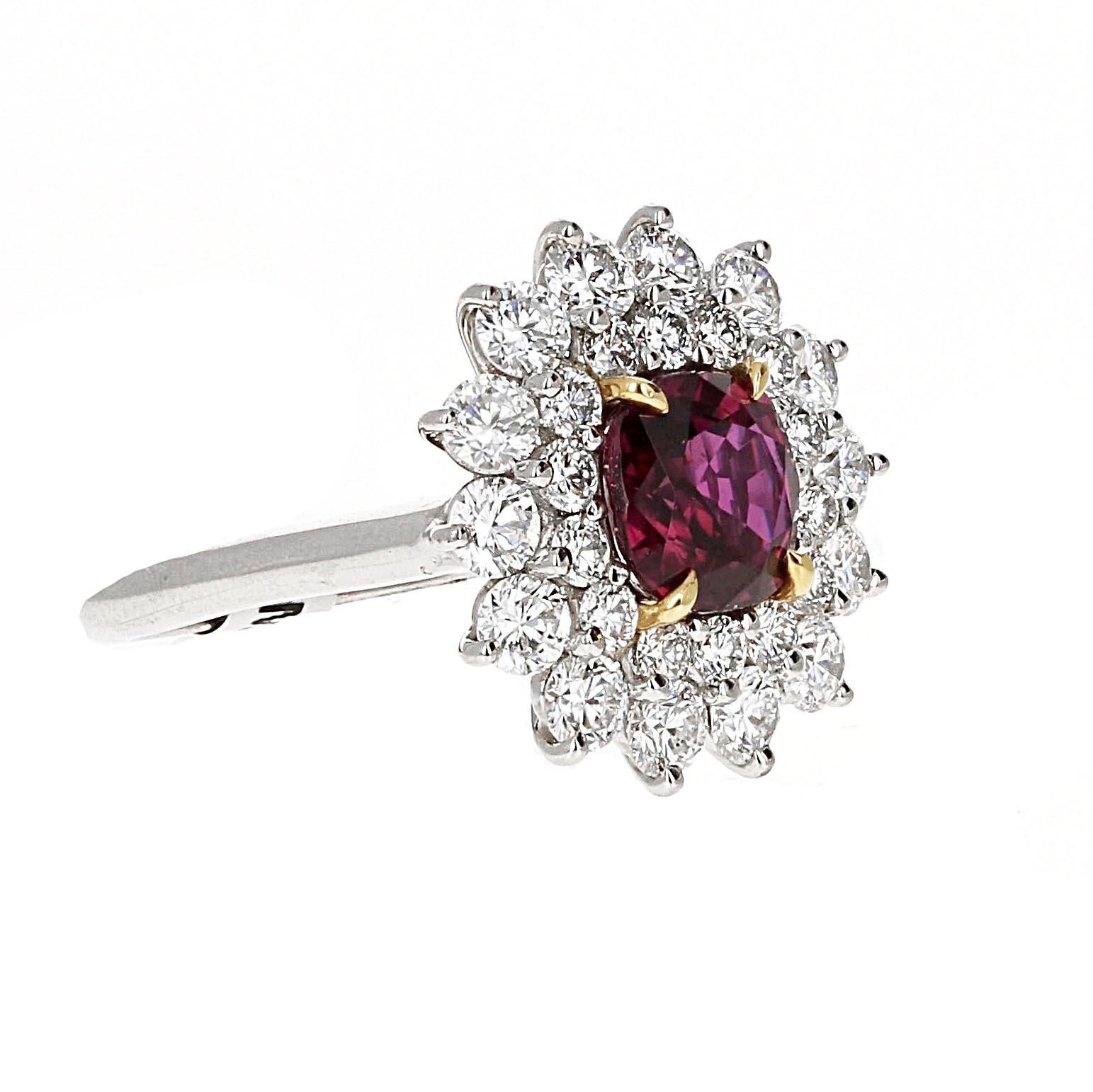 Tiffany & Co. GIA-certified 2.22-carat Thailand No Heat Ruby Cushion Cut Ring with 2 carats of colorless diamonds in a one-of-a-kind halo design

The center stone in the remarkable ring is the 2.22-carat ruby, sourced from Thailand and certified by