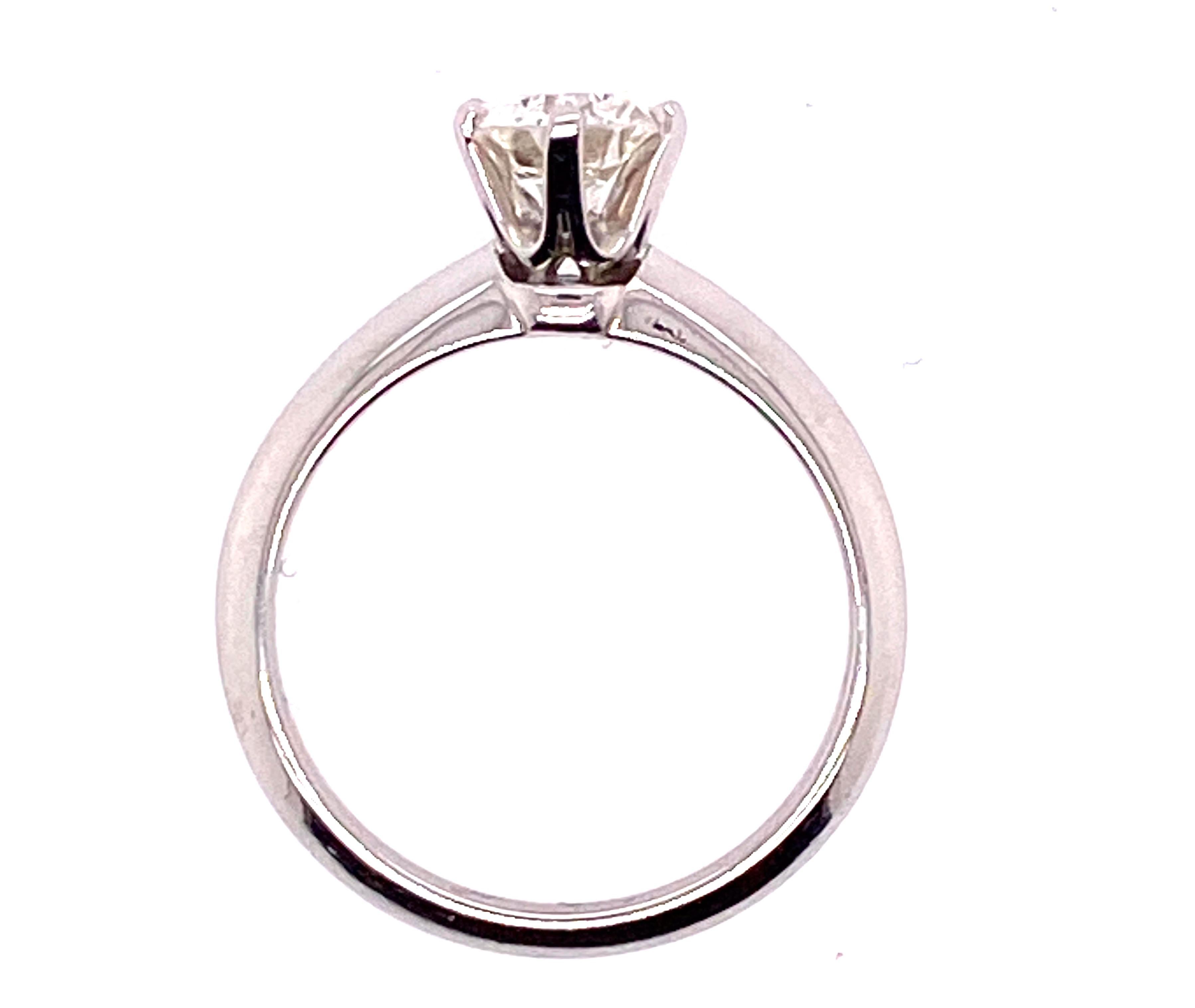 Tiffany & Co. GIA Certified .90ct G-VVS1 XXX Diamond Solitaire Platinum Engagement Ring



Featuring a Stunning Tiffany Inscribed .90ct G-VVS1 Genuine Natural Round Brilliant Cut Diamond

Tiffany Retail $16,200

100% Genuine Tiffany & Co.

Laser