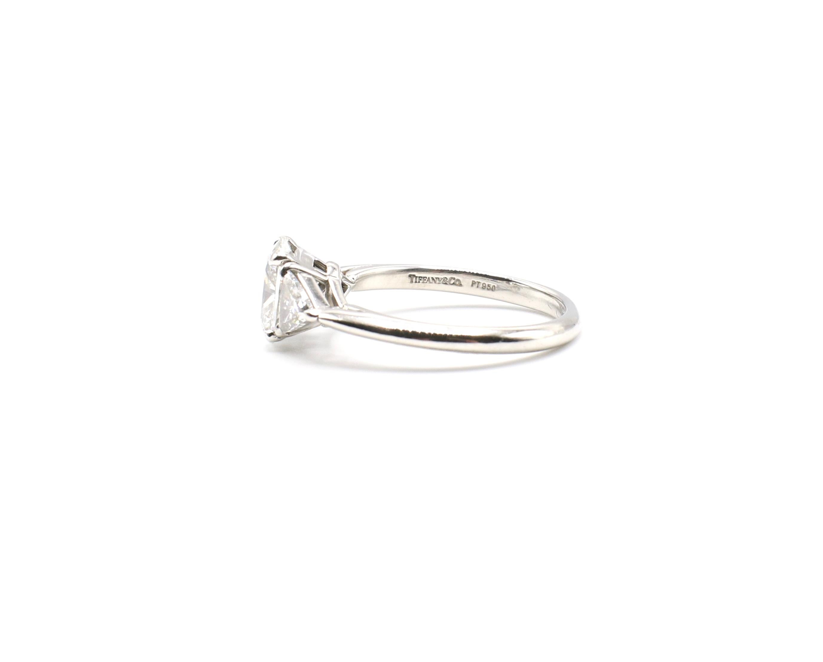 Modern Tiffany & Co. GIA Platinum Diamond 1.31 Oval F VVS2 with Trillions Ring