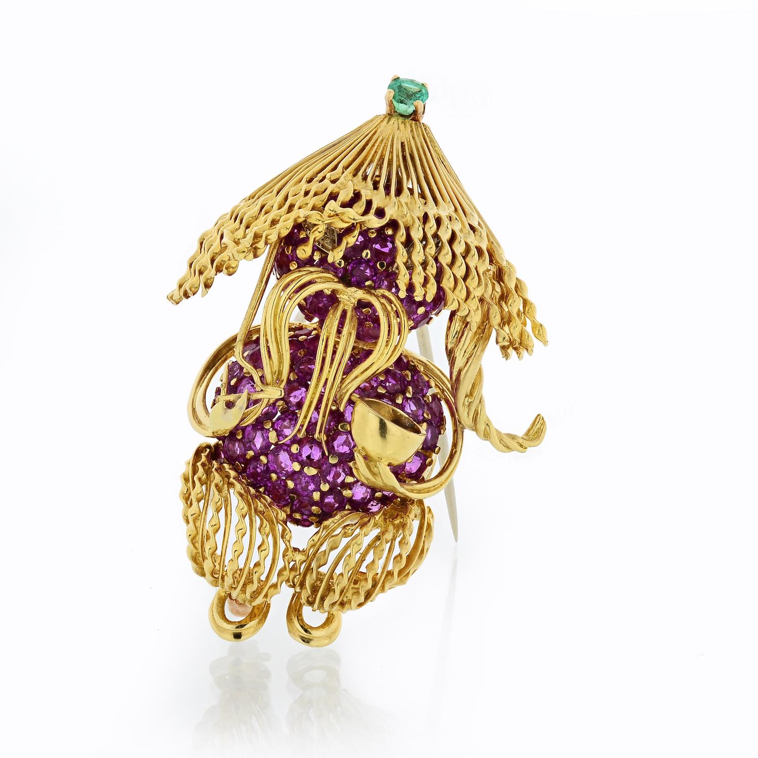 Tiffany & Co.
Gold 18k Yellow Brooch with Pink Sapphires By Jean Schlumberger

Yellow Gold Brooch from Tiffany & Co. designed by Jean Schlumberger.
Encrusted with pink sapphires, mounted with one green emerald this pin resembles a man eating noodles
