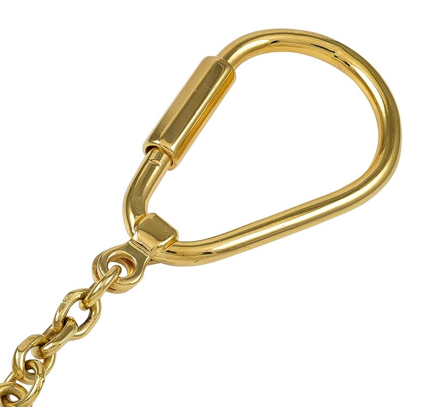 gold porsche keychain