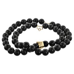 Tiffany & Co. Collier en or et onyx