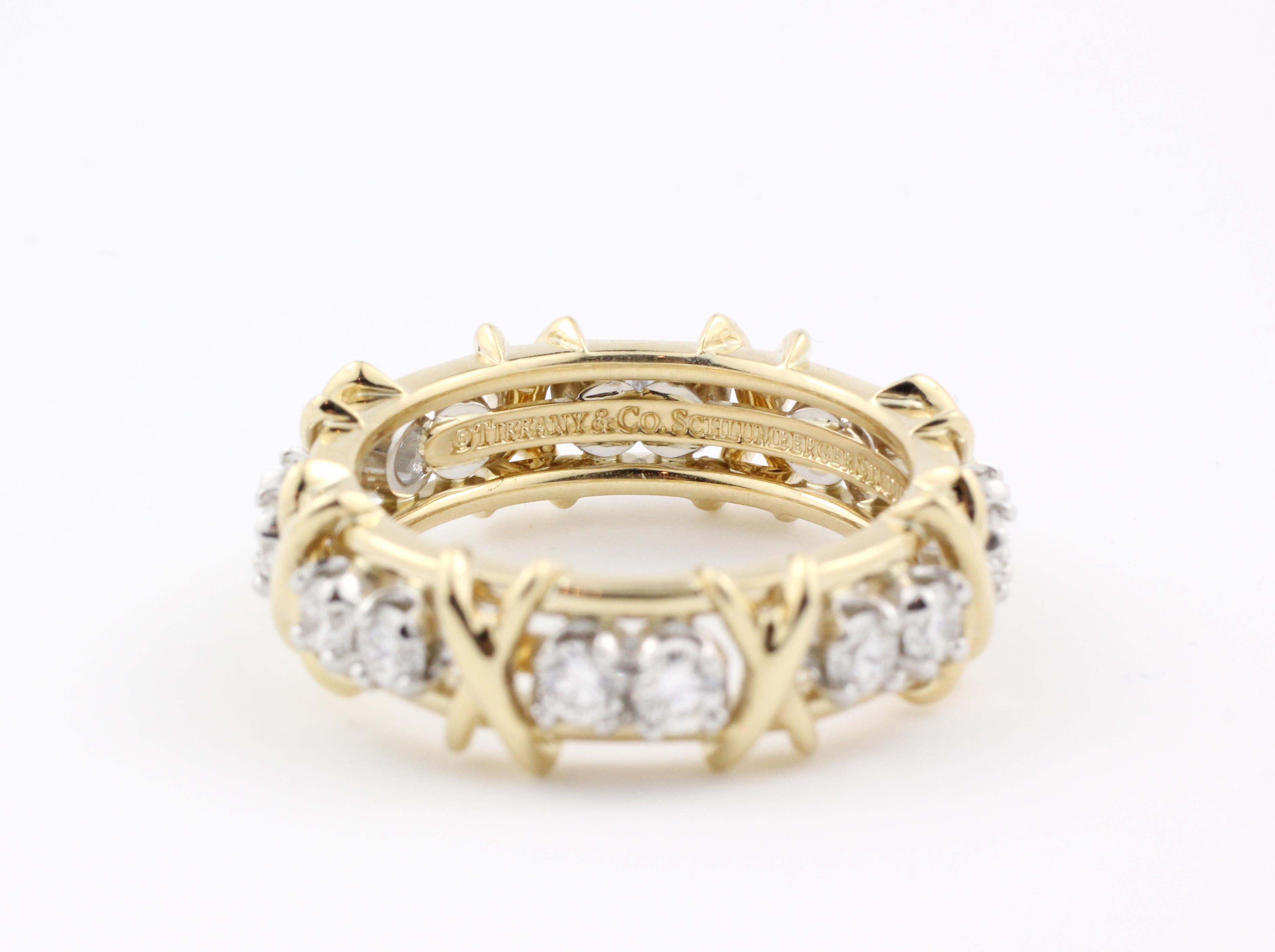 Contemporary Tiffany & Co. Gold and Platinum Schlumberger Diamond Ring