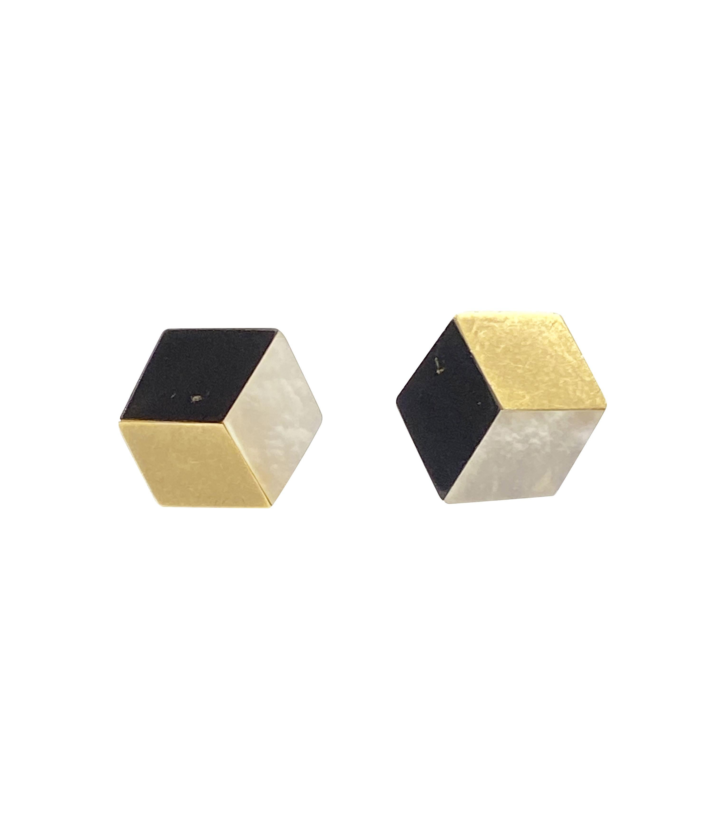 Circa 1980 Tiffany & Company 18K Yellow Gold Earrings, measuring 7/16 inch square the 3 sided earrings are designed in an illusion style giving them a dimensional effect. Set with Onyx and Mother of Pearl. Post backs. 