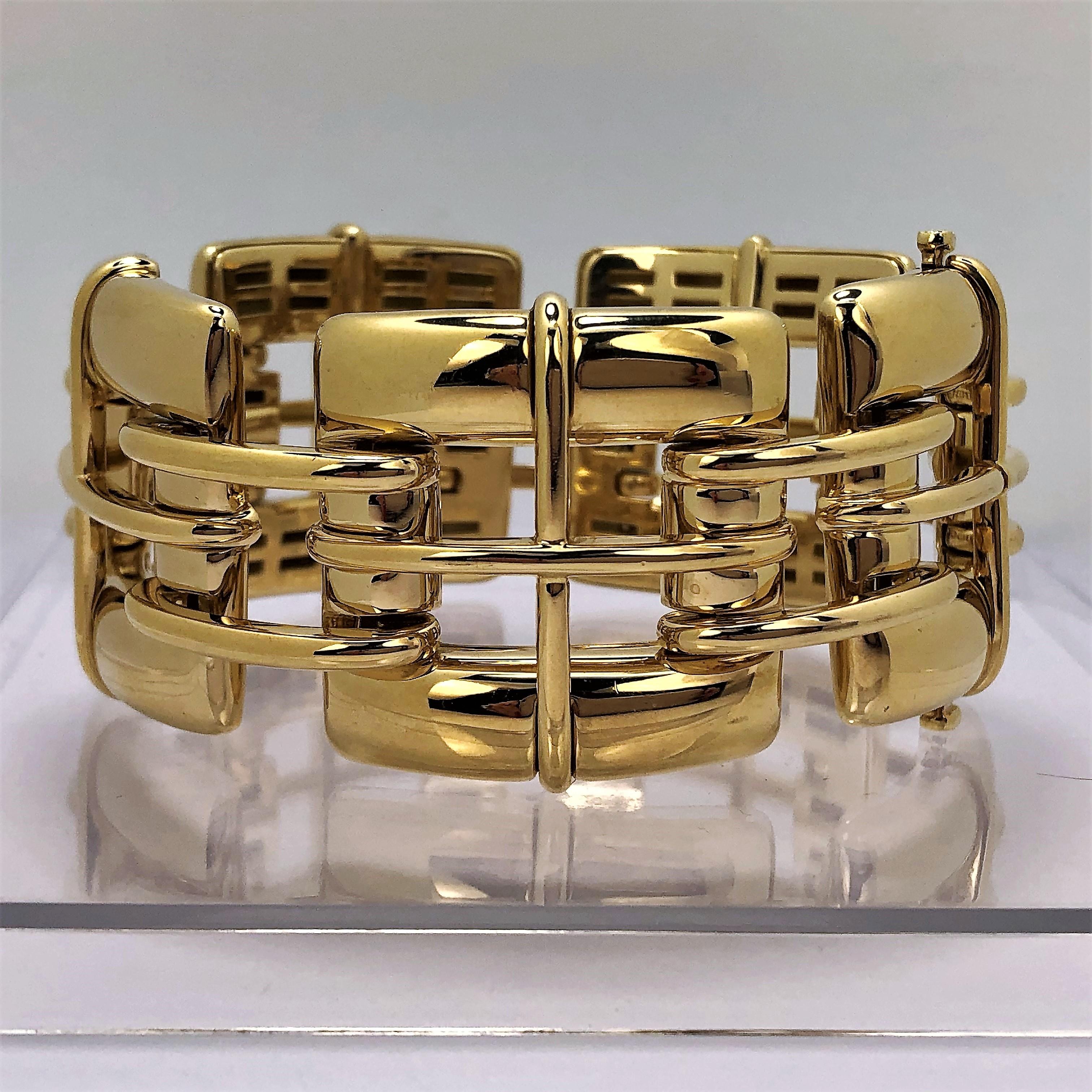 One ladies 18 karat yellow gold Biscayne model bracelet by Tiffany & Co measuring  1 1/4 inches 
wide and 7 1/2 inches long. This stylish bracelet is comprised of five 1 1/4 inch by 1 1/4 inch open links
connected by two curved horizontal links.