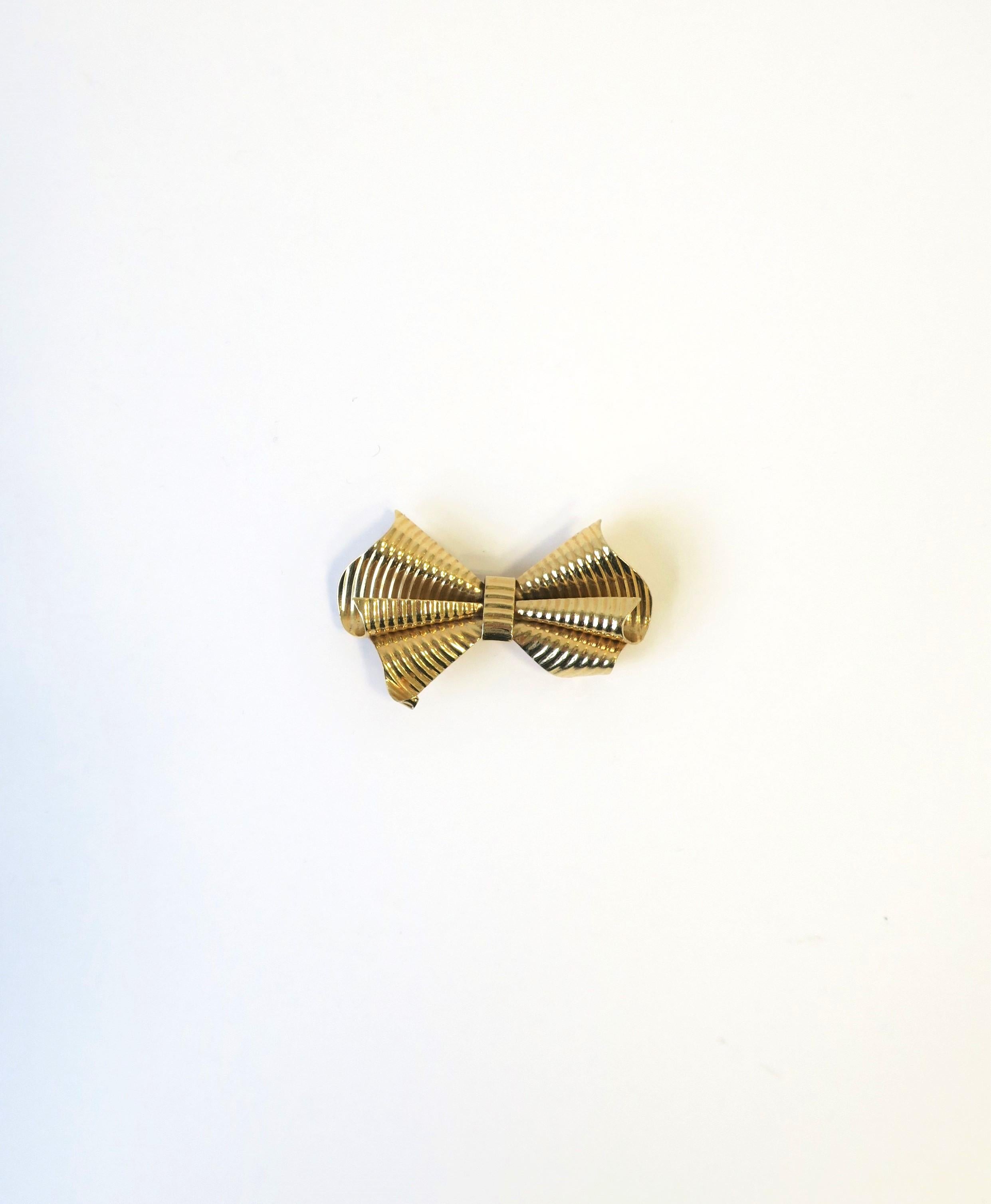 Tiffany & Co. Gold Bow Brooch In Excellent Condition In New York, NY