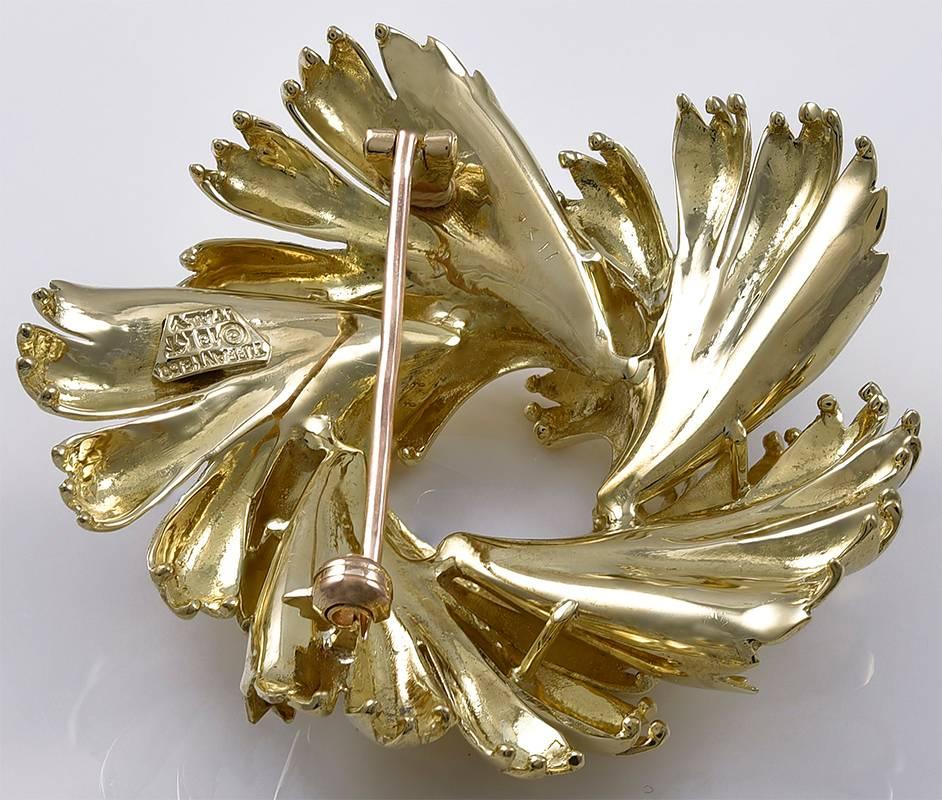 Leafy gold brooch.  Made and signed by TIFFANY & CO.  Three-dimensional.  18K yellow gold.  1 3/4