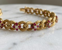 Tiffany & Co. Goldkettenarmband mit Rubinen und Diamanten