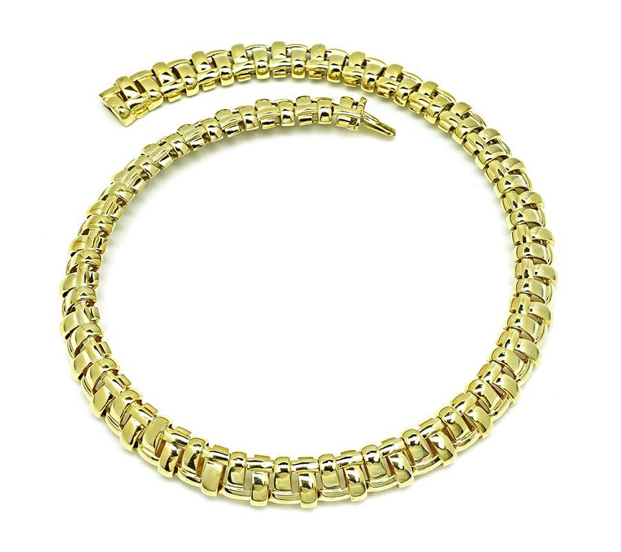 Questa è una splendida collana in oro giallo 18k. La collana misura 12 mm di larghezza e 15 pollici di lunghezza. La collana è T&T 750 ITALY e pesa 98,9 grammi.