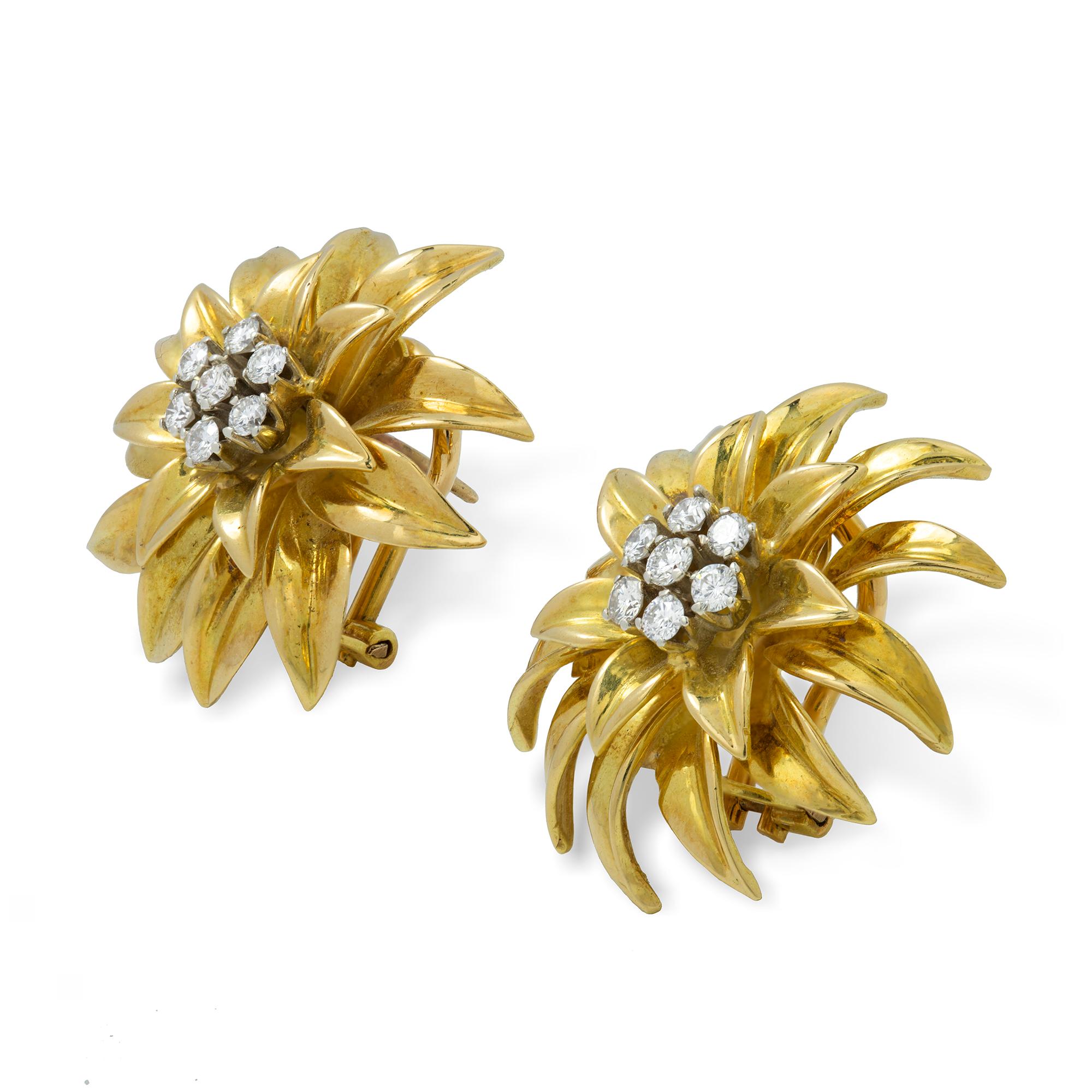 A pair of Tiffany & Co gold earrings, in the form of a gold chrysanthemum each set with seven round brilliant-cut diamonds to the centre, signed Tiffany 18ct yellow gold, with post and clip fittings, gross weight 15.5 grams.