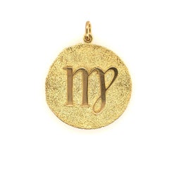 TIFFANY & CO. Gold & Diamond "Virgo" Pendant.