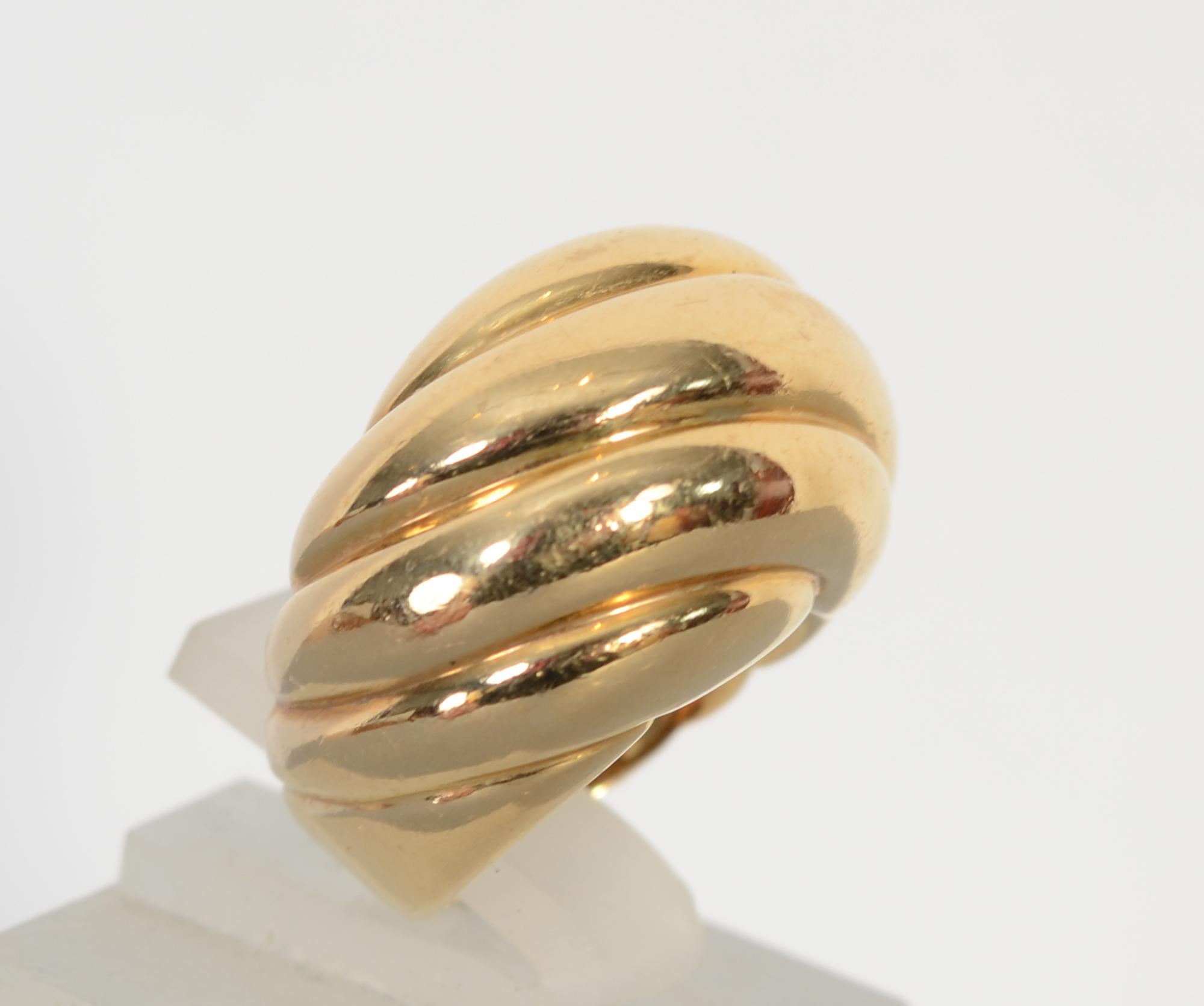 Tiffany classic gold dome ring with the addition of a swirled design.
The dome is half an inch in height. The ring is size 4 3/4. It can easily be sized up or down. The ring measures 5/8