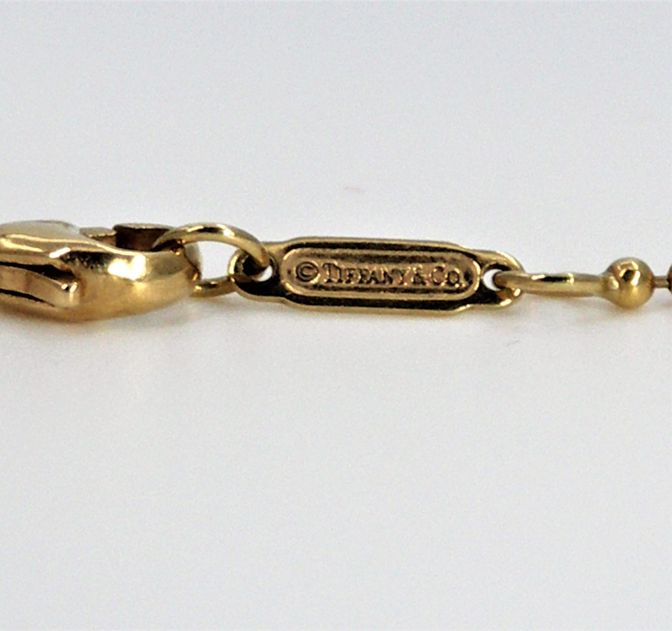 Tiffany & Co. Gold Graduated 5 Ball Pendant or Necklace In Excellent Condition For Sale In Palm Beach, FL