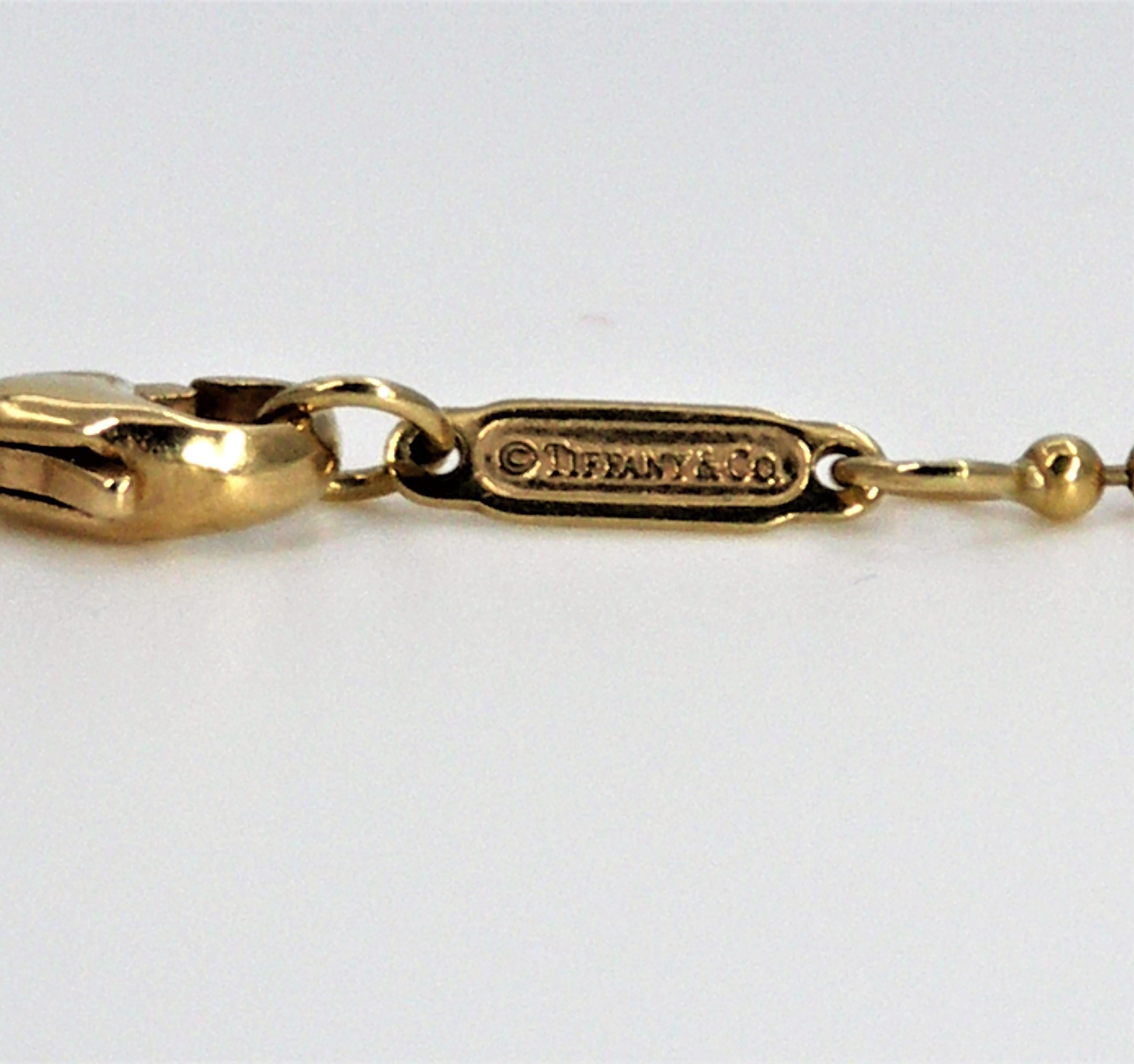 Tiffany & Co. Gold Graduated 5 Ball Pendant or Necklace In Excellent Condition In Palm Beach, FL