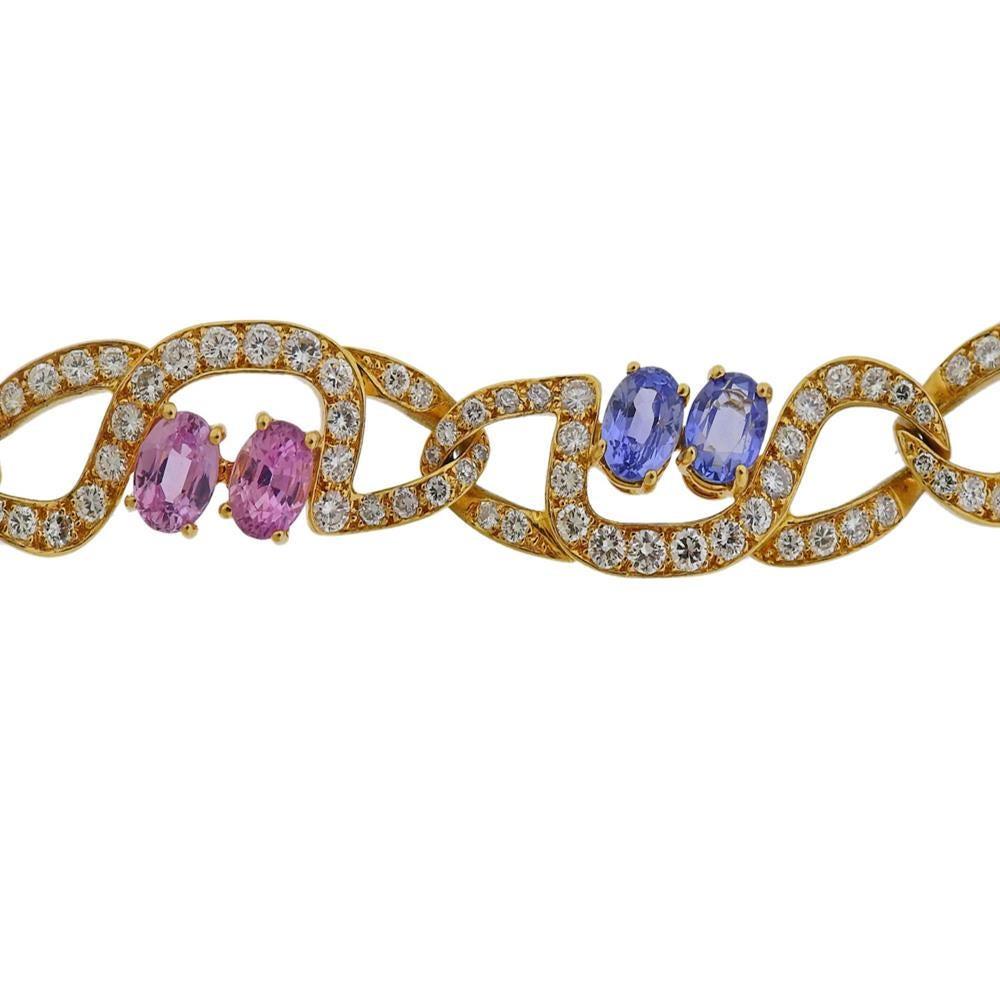 18k gold bracelet by Tiffany & Co, set with approx. 6.00-6.50ctw in diamonds and 4 yellow, 4 pink and 4 blue sapphires - each stone approx. 0.80-0.85cts, total approx. 10cts +.  Marked Tiffany & Co. Bracelet is 7.25