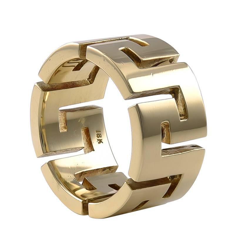 Bold gold ring, with geometric cut-out pattern.  Made and signed by TIFFANY & CO.  Heavy gauge 18K yellow gold.  Size  5.5. 
A distinctive dramatic statement.

Alice Kwartler has sold the finest antique gold and diamond jewelry and silver for over