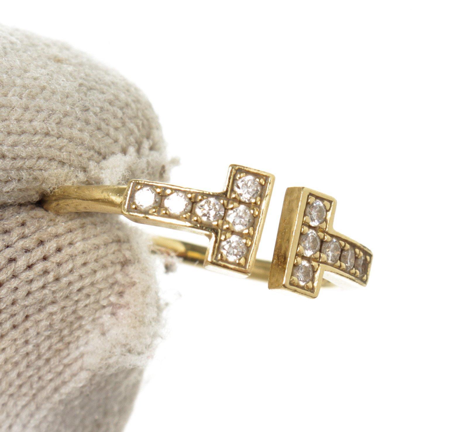 Tiffany & Co Gold T Wire Diamond Ring with gold-tone hardware. 

47101MSC