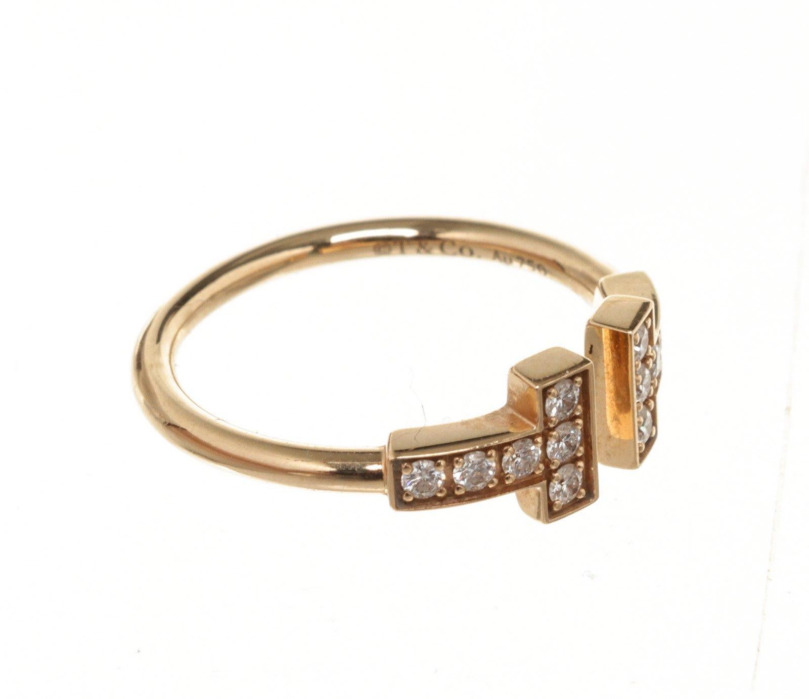 Tiffany & Co Gold T Wire Diamond Ring with gold-tone hardware. 

47113MSC
