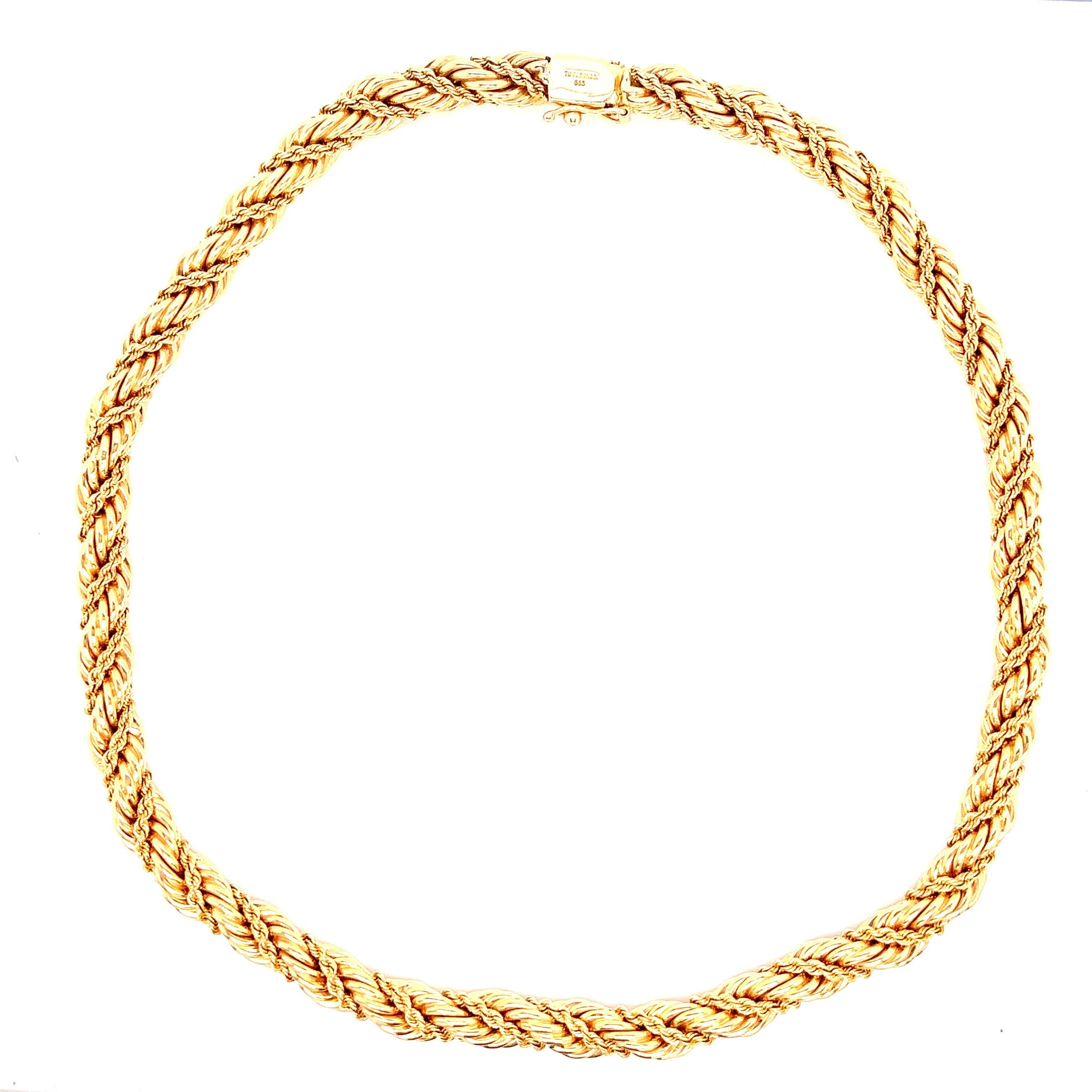Tiffany & Co. 14 karat yellow gold necklace with twisted ropes motif. Marked: Tiffany & Co. / 585. Total weight: 57.1 grams. Length: 16.5 inches. Width: 0.25 inch.