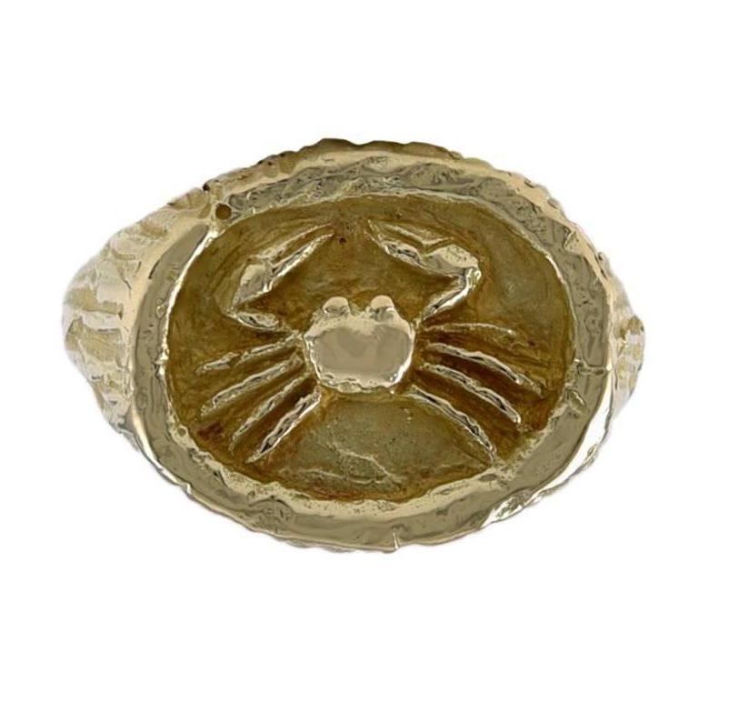 Distinctive zodiac signet style ring with an applied crab in shiny 18K yellow gold.  The background is textured 18K textured gold.  Raised gold border.  Made and signed by TIFFANY & CO.  Size 5 and can be custom-sized.   Rare and collectible.

Alice