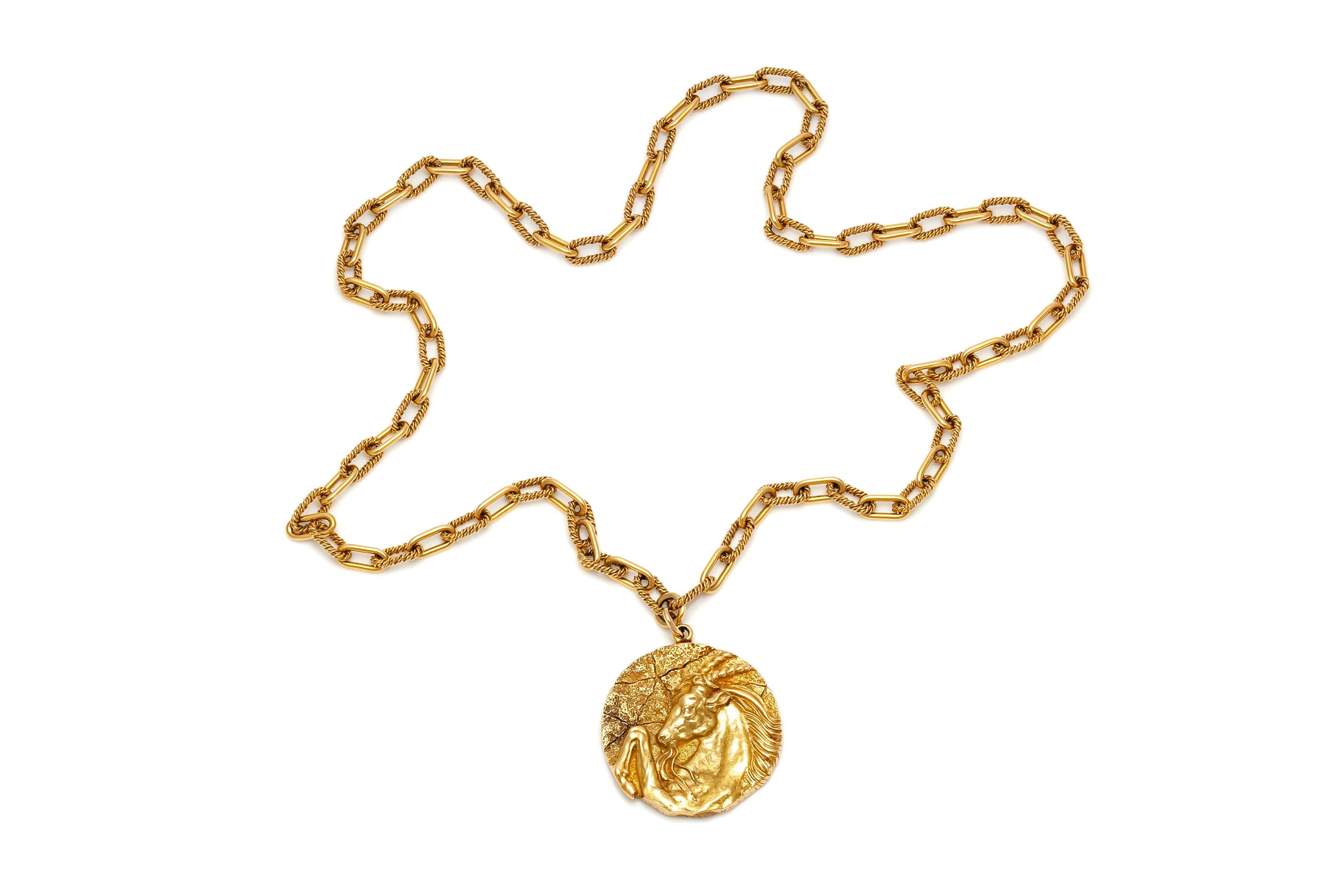Tiffany & Co. necklace, finely crafted in 18k yellow gold with zodiac pendant. Circa 1970's.