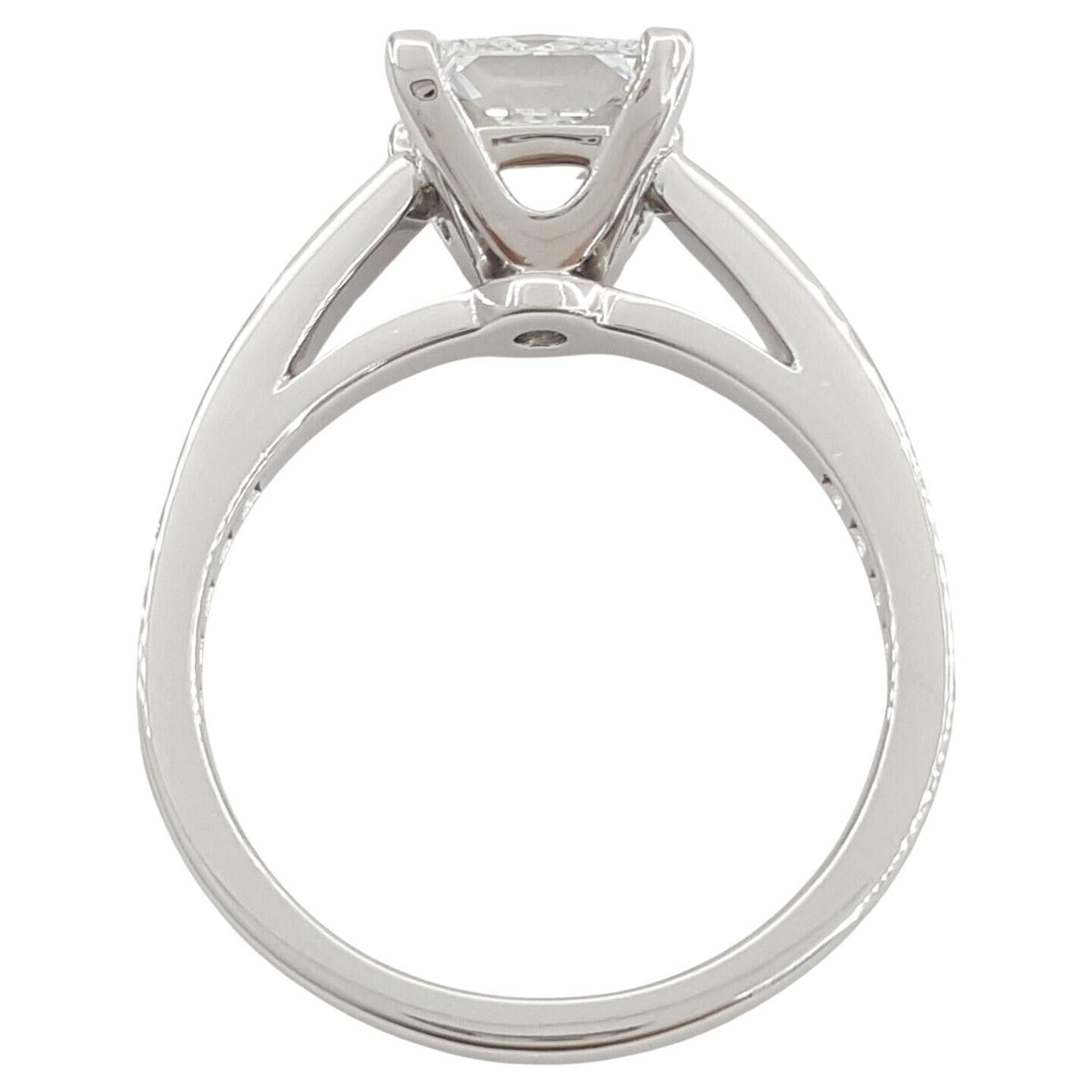 Tiffany & Co. presents the NOVO Platinum Princess Brilliant Cut Diamond Engagement Ring, featuring a 1.76 ct Princess Brilliant Cut Natural Diamond with specifications of F color, VS1 clarity, and excellent cut, polish, and very good symmetry. The