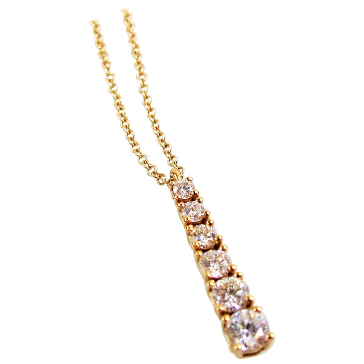 Tiffany and Co. Rose Gold and Diamond Circle Tiffany T Pendant at 1stDibs