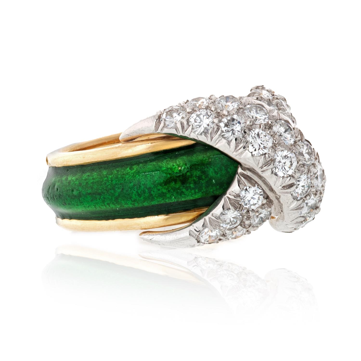 Jean Schlumberger's visionary creations are among the world's most intricate designs. Pave diamonds form an abstract X design, a popular symbol of love.

18k gold and platinum with green enamel and round brilliant diamonds
Carat total weight