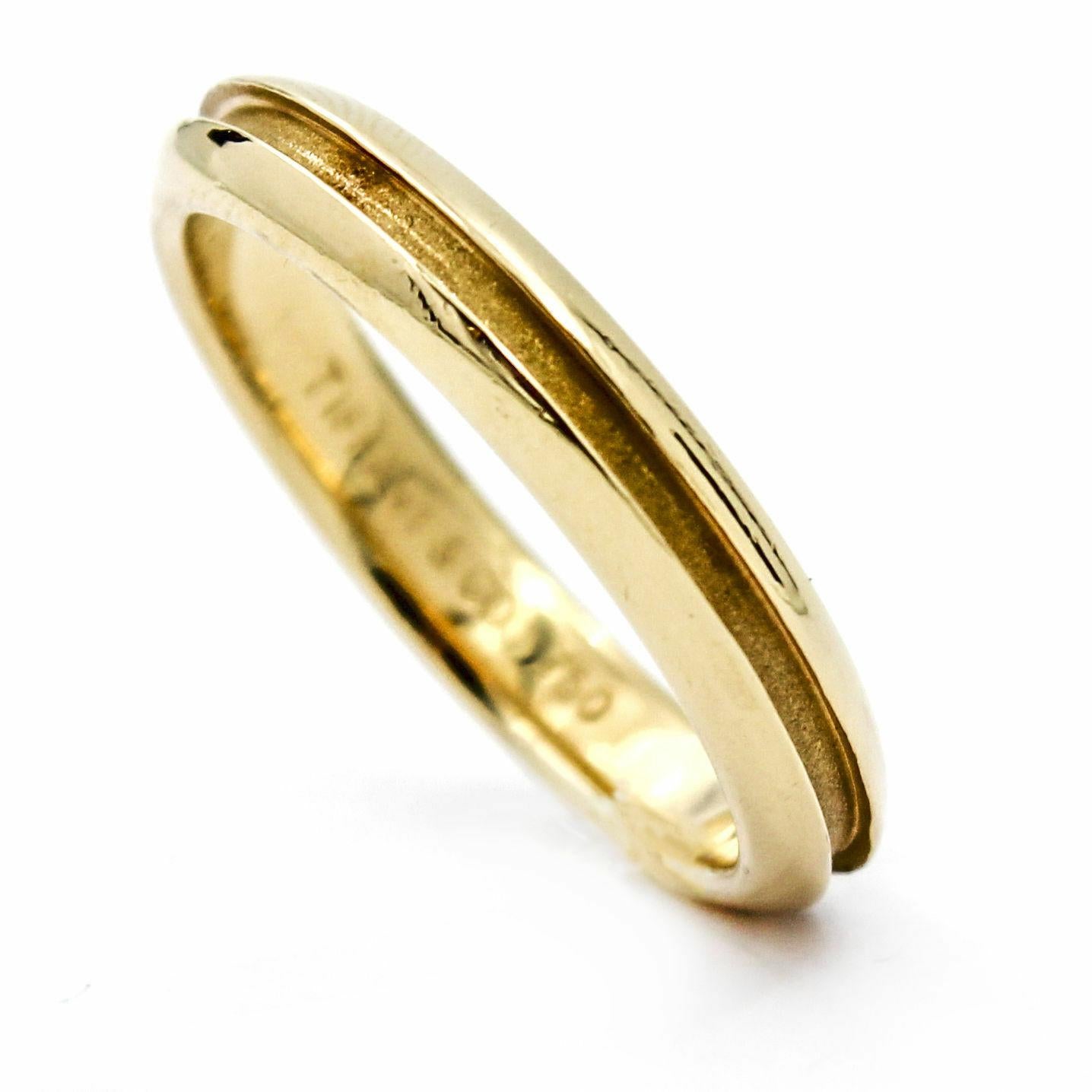 Tiffany & Co. 3.5 mm yellow gold wedding band. Size 6.5. Retired. Pictures provided are of the actual item for sale. 

Previously owned. In excellent condition with expected wear. Tiffany box not included. Professionally cleaned and