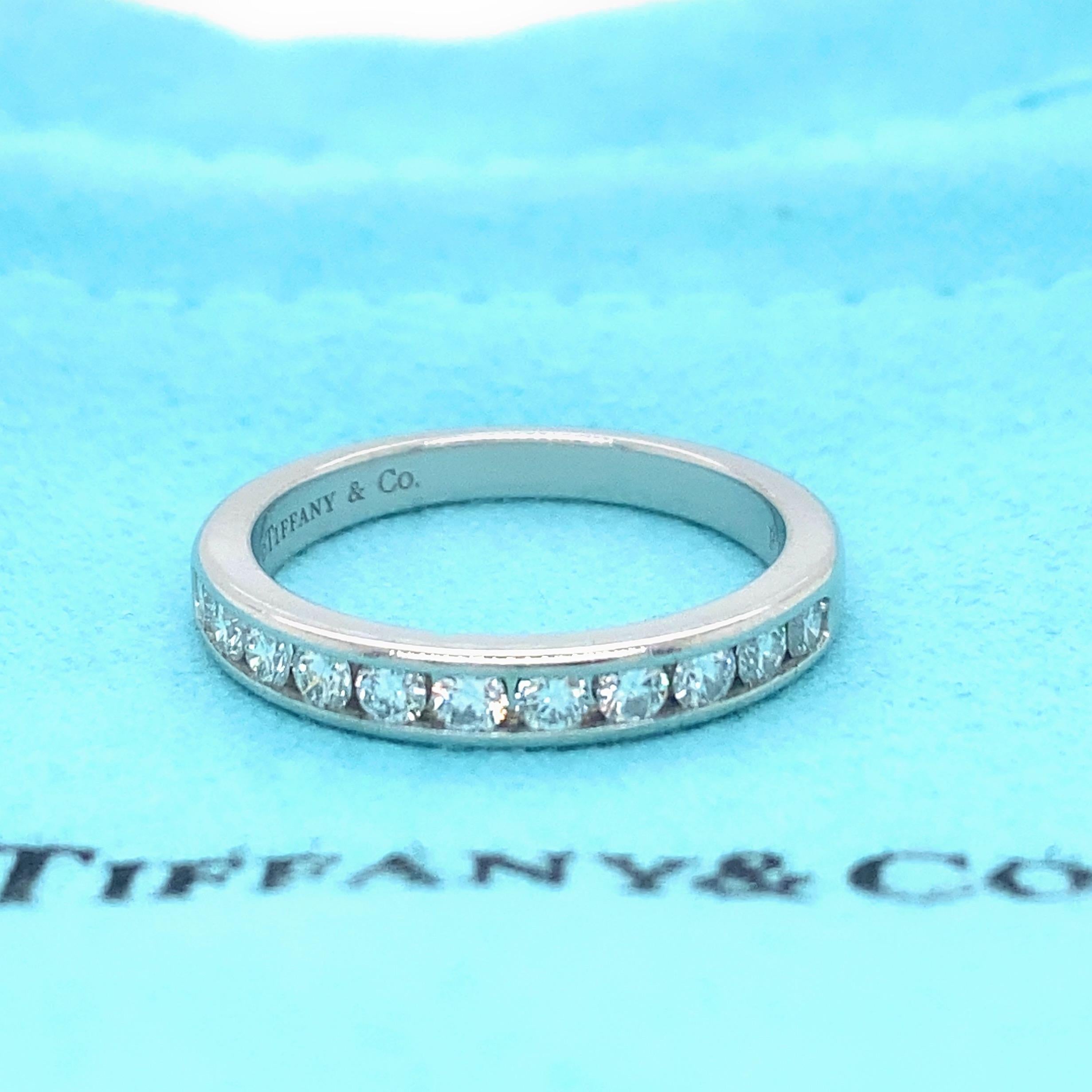Tiffany & Co. Half-Circle Channel-Set Diamond Band
Style:  Channel-Set
Width:  3 MM
Metal:  Platinum PT950
Size:  5.75 sizable
TCW:  0.33 tcw
Main Diamond:  11 Round Brilliant Diamonds 
Color & Clarity:  F - G / VS - SI
Hallmark:  ©TIFFANY&CO.